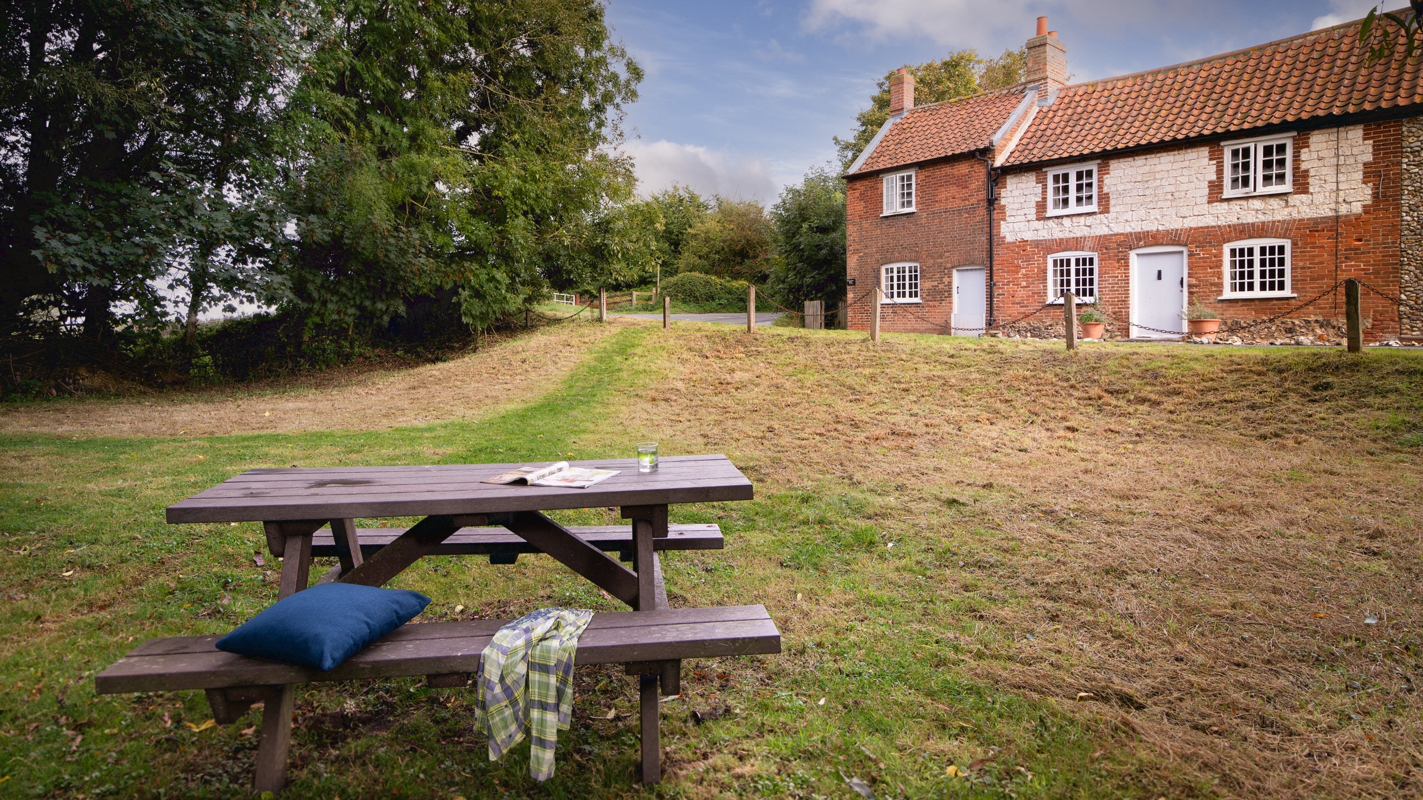 The shared area overlooking the mill stream opposite Mrs Preedy's Cottage, Norfolk
