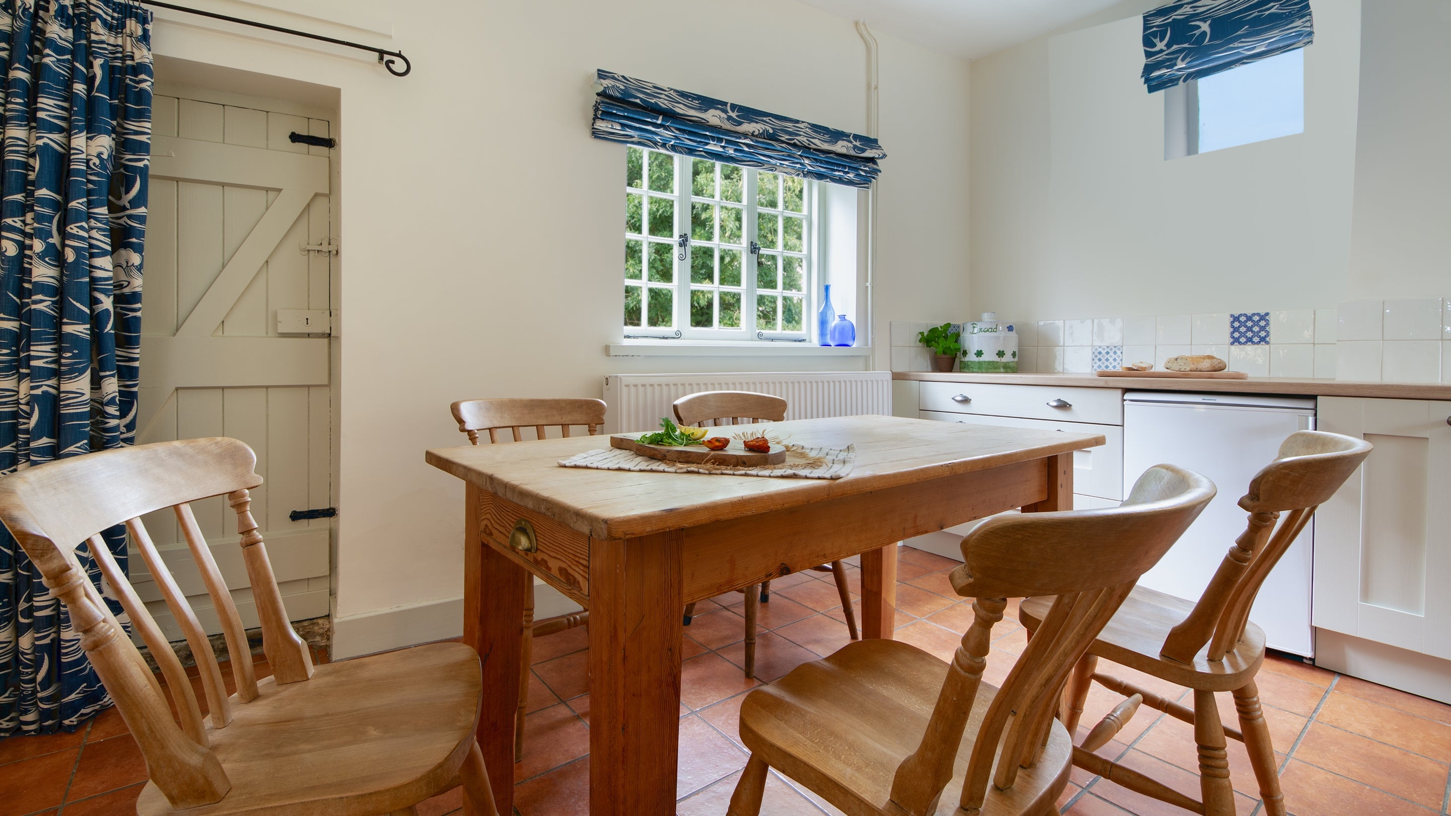 The kitchen with dining table at Mrs Preedy's Cottage, Norfolk