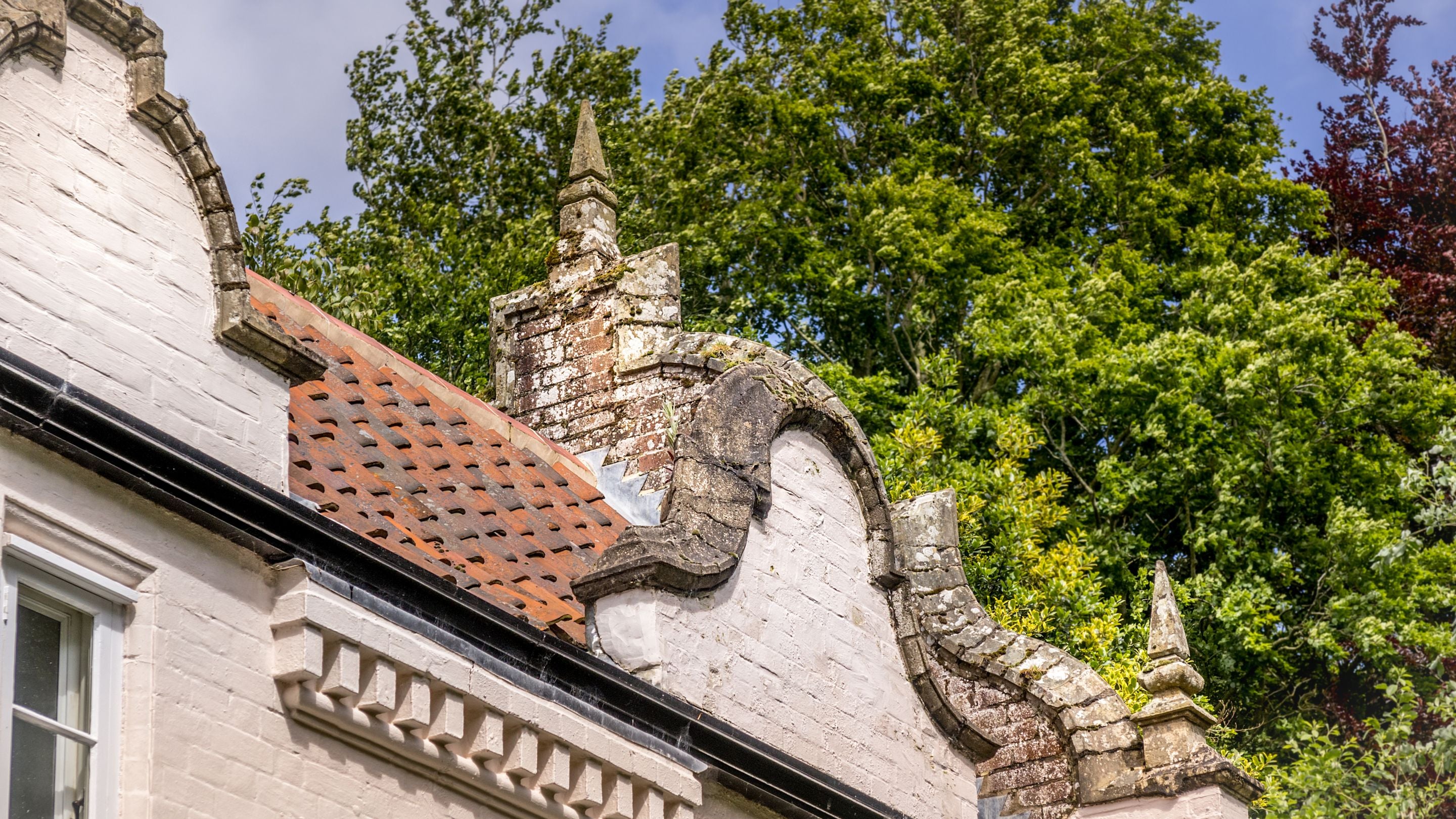 Decorative roof details are in the neo-Jacobean style at Sexton's Lodge, Norfolk