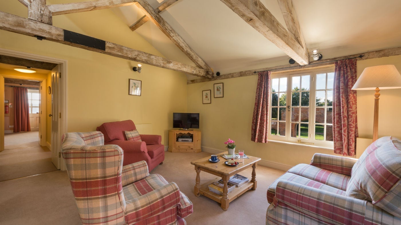 The cosy sitting room at Squire's Loft, Cromer, Norfolk