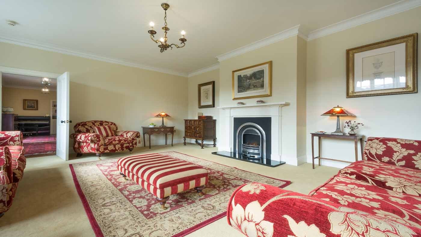 The cosy sitting room at The Squire's Retreat, Cromer, Norfolk