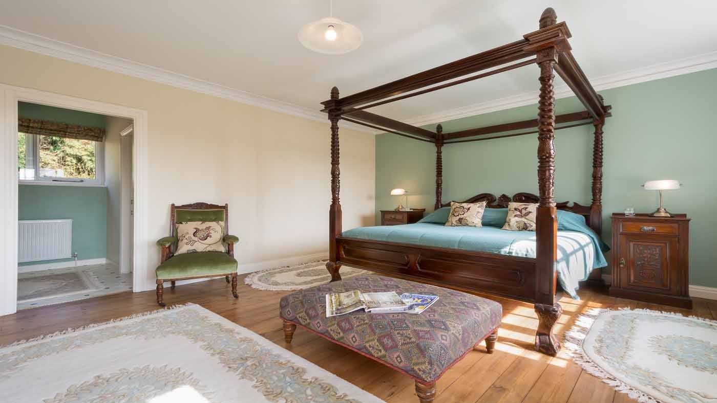A grand four poster bed at The Squire's Retreat, Cromer, Norfolk