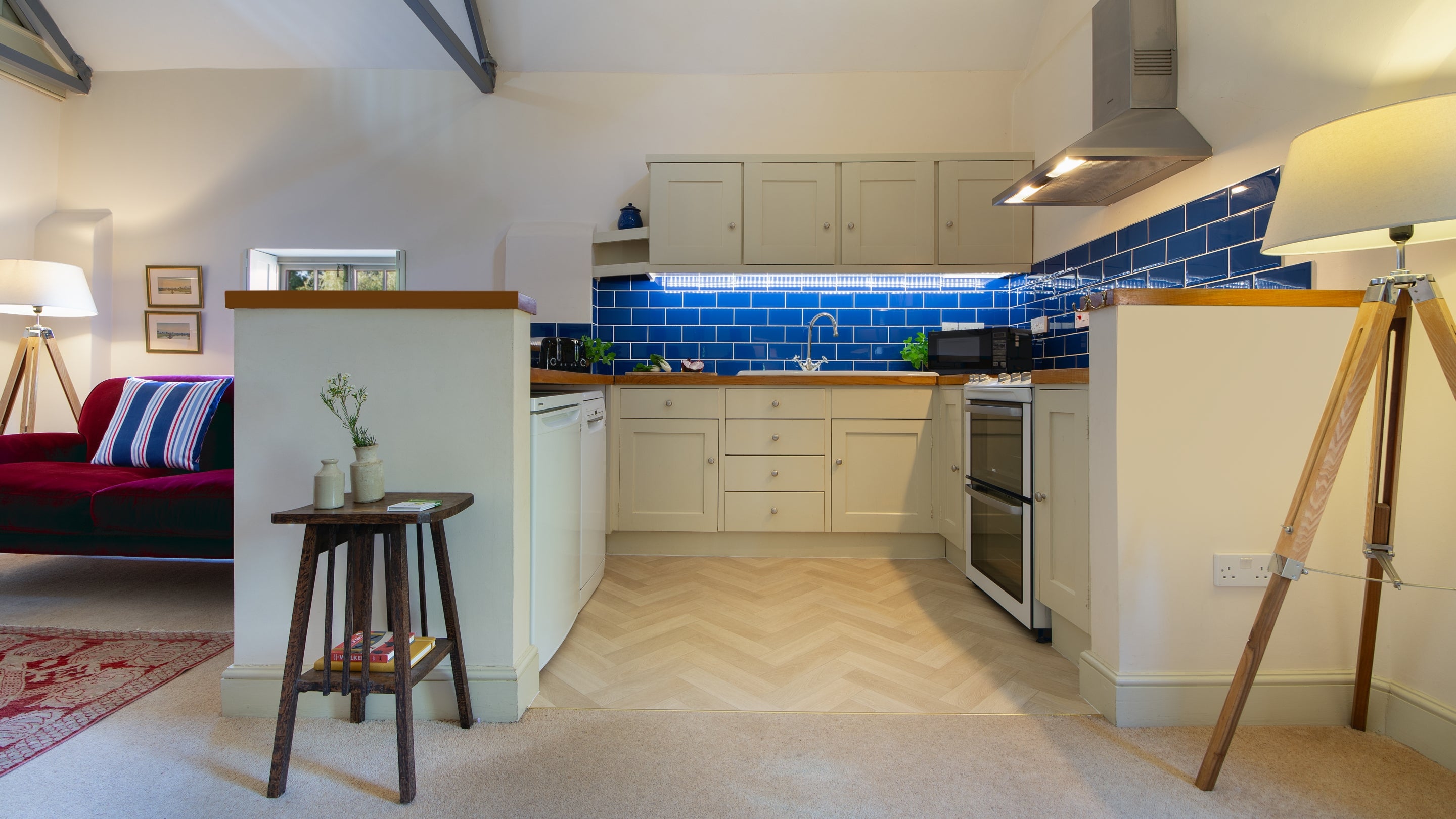 The ktichen area in the open-plan kitchen, dining and sitting room at Watermill Apartment, Norfolk
