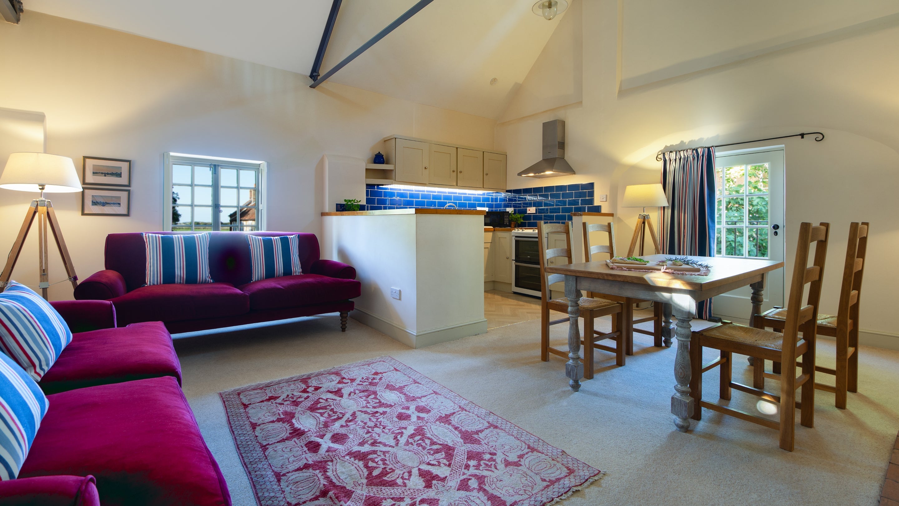 The open-plan kitchen, dining and sitting room at Watermill Apartment, Norfolk