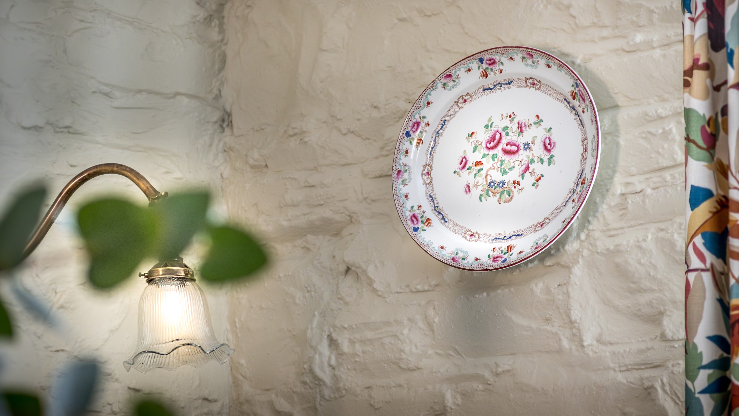 A plate on the wall in the dining room at Castle Gamekeeper's Lodge, County Down