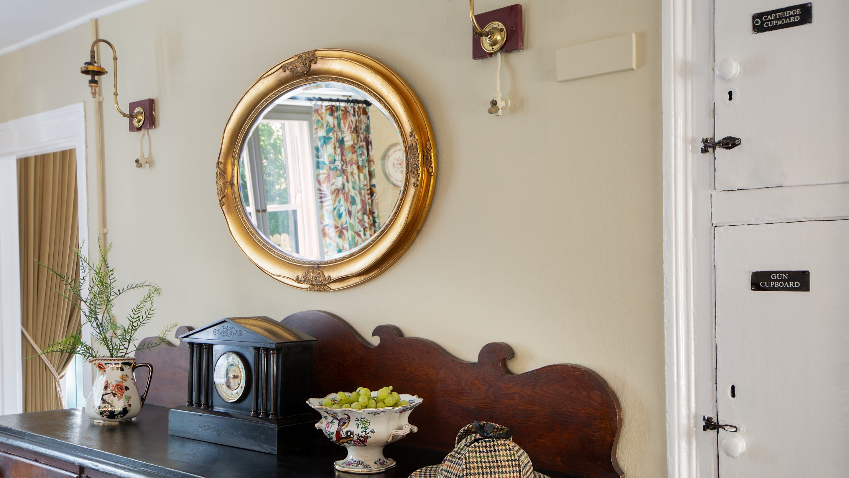 The original gamekeeper’s gun cupboard in the dining room at Castle Ward Gamekeeper's Lodge, County Down