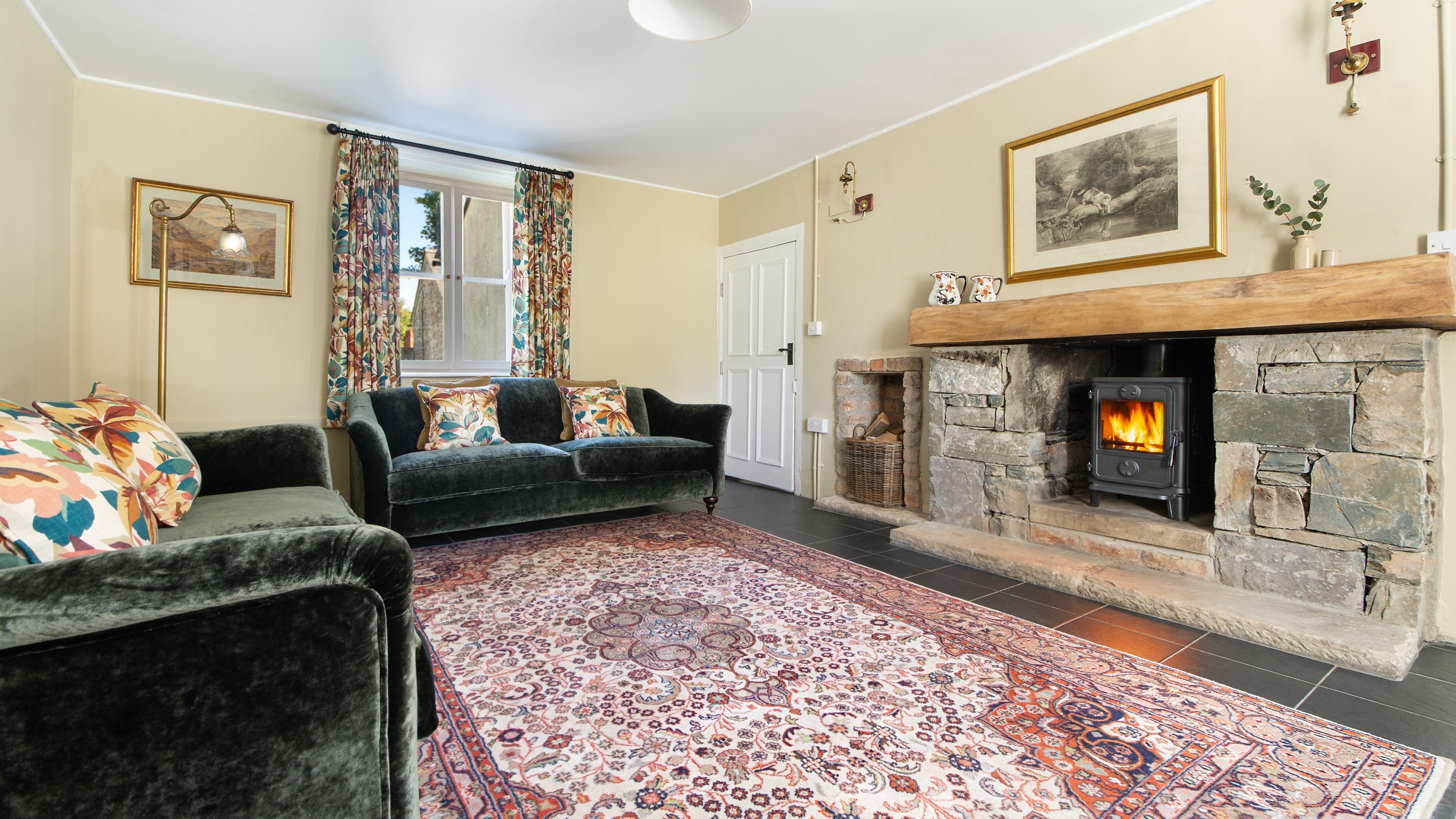 The sitting room with woodburner at Castle Ward Gamekeeper's Lodge, County Down