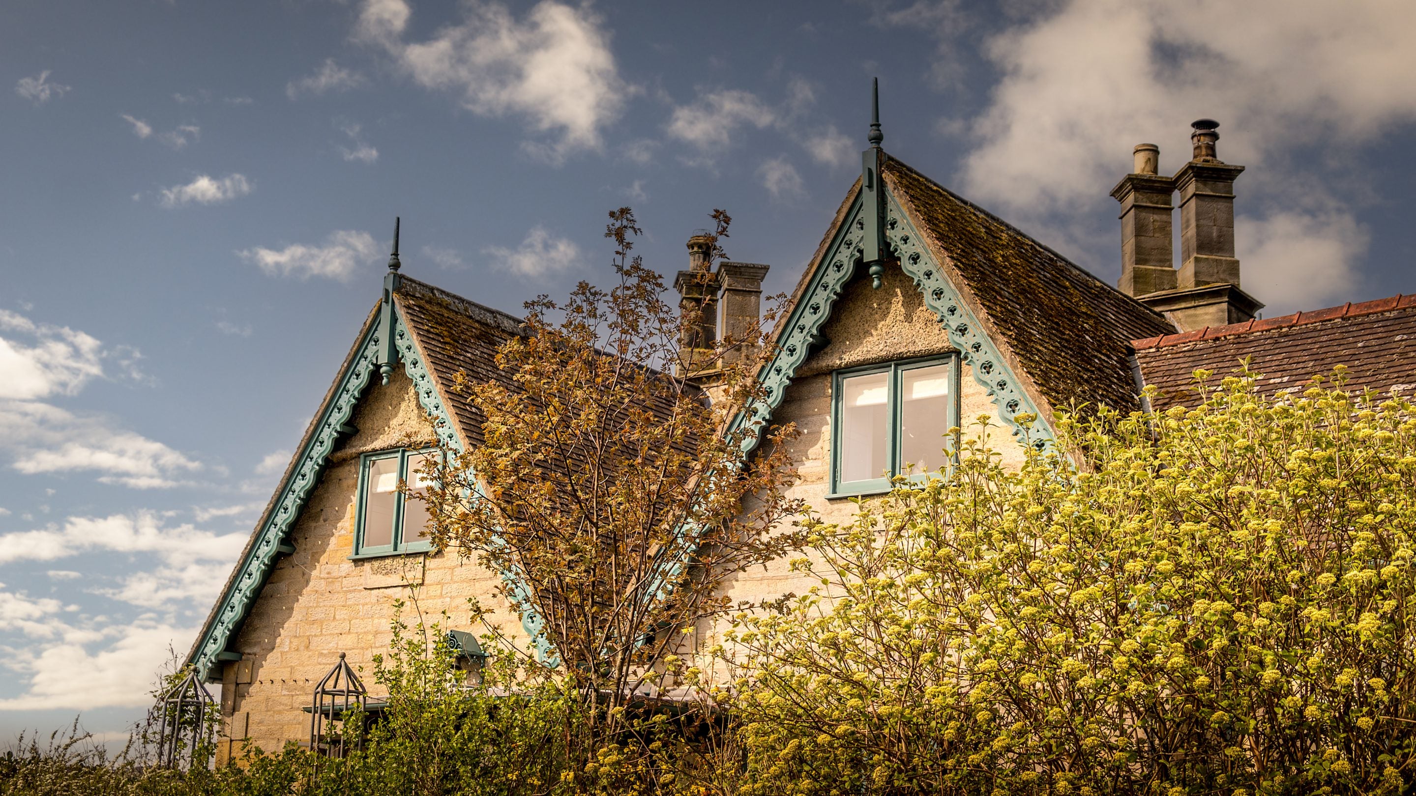 Windows of the two twin bedrooms at Cragside Garden Cottage, Northumberland