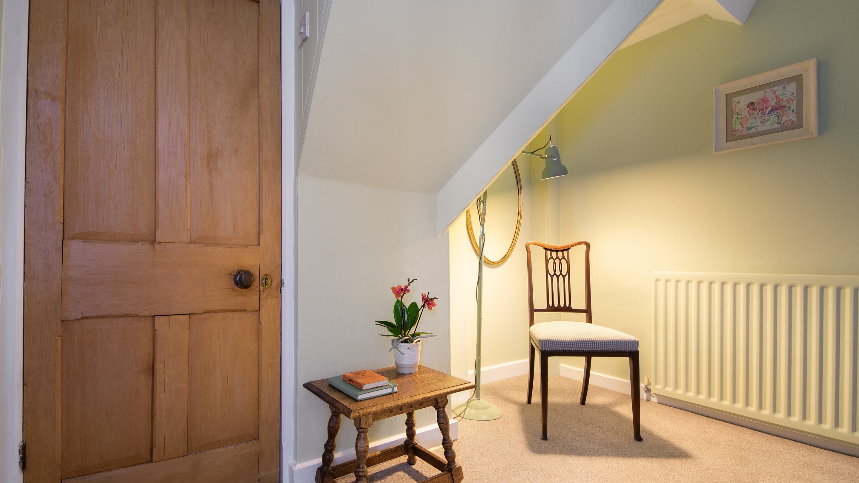 The hall on the first floor of Cragside Park Cottage, with some angled and low ceiling, Northumberland