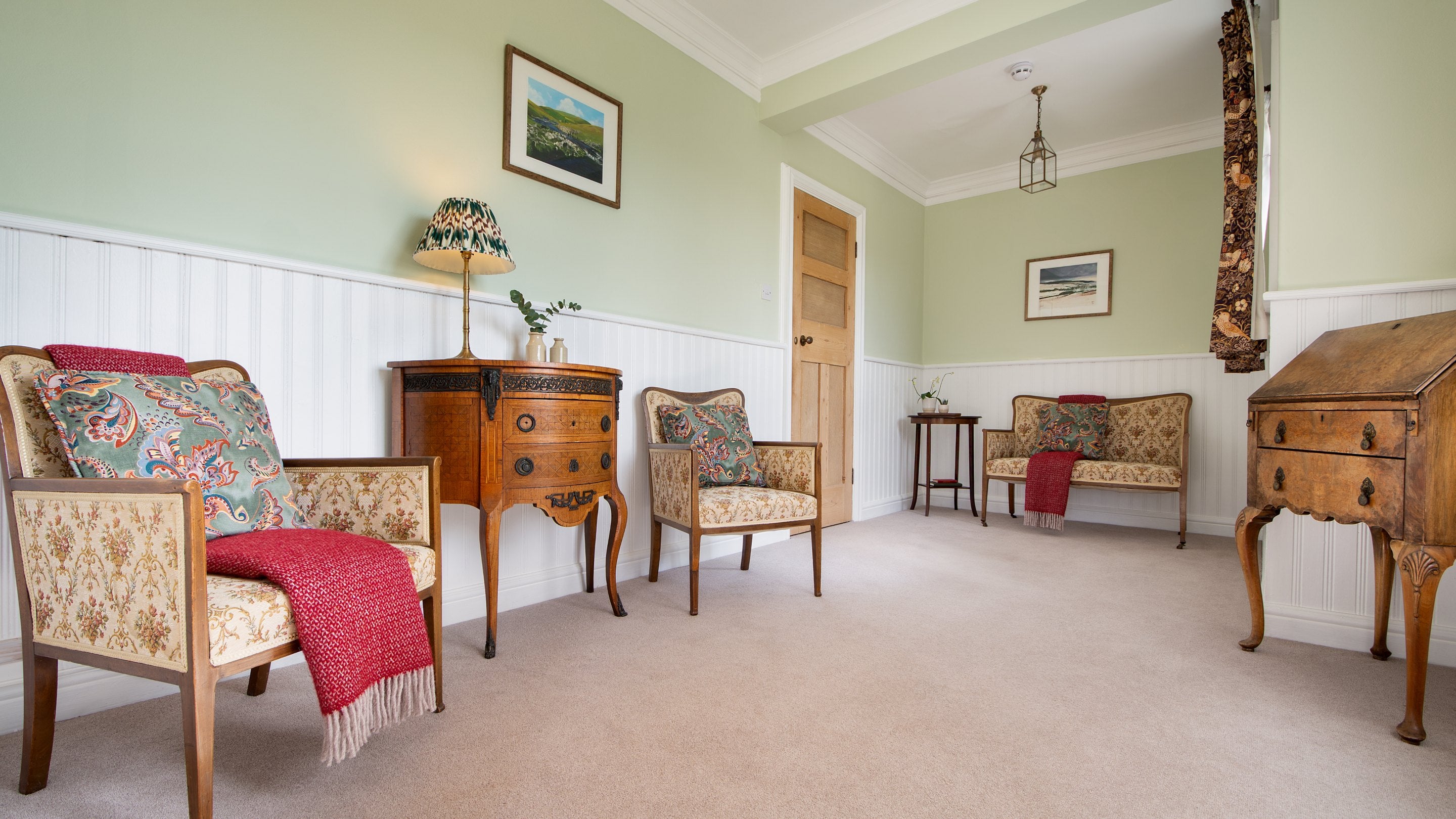 The lobby with armchairs at Cragside Park Cottage, Northumberland