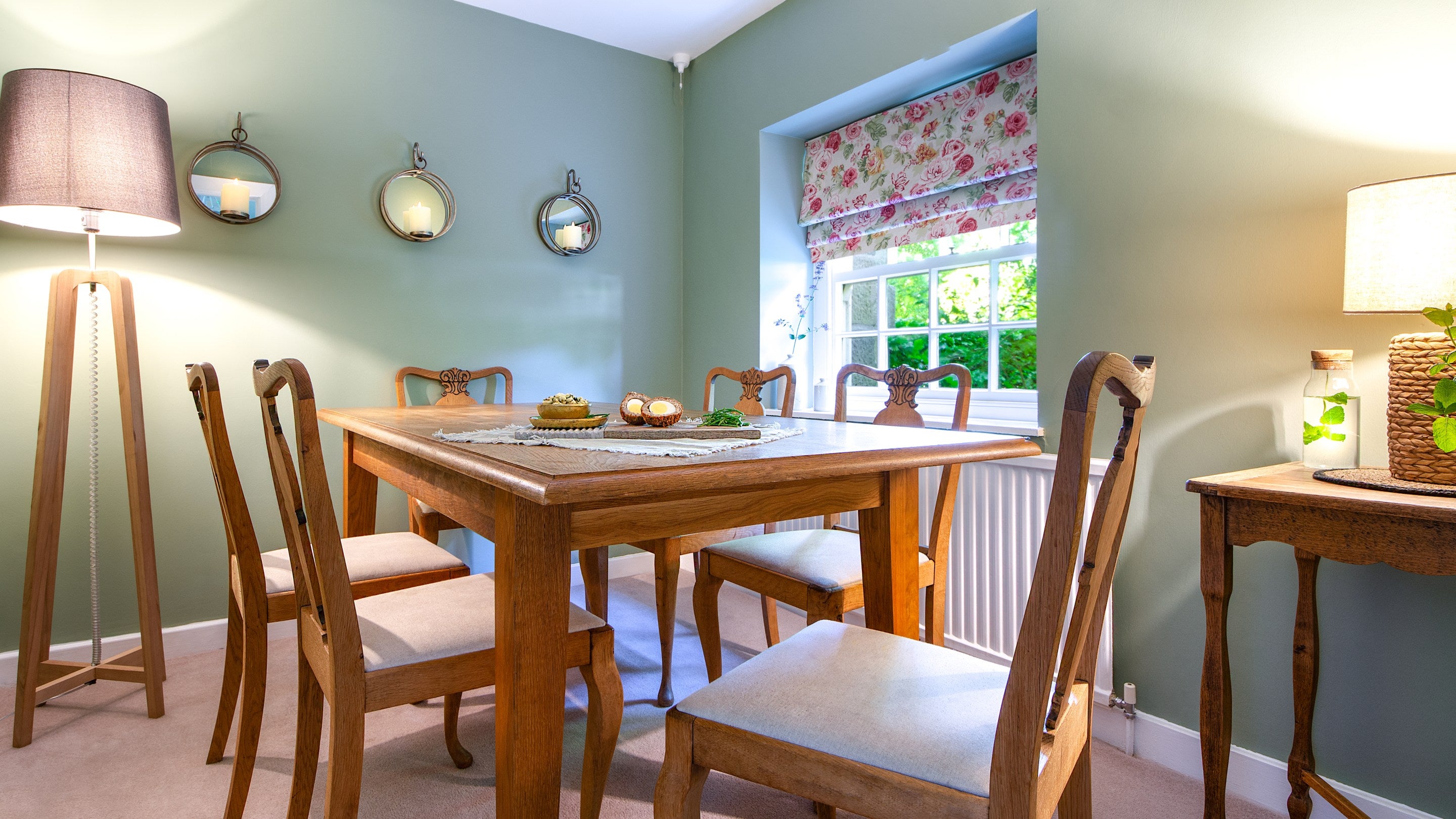 The dining room with chairs for six at Laundry Cottage, Northumberland
