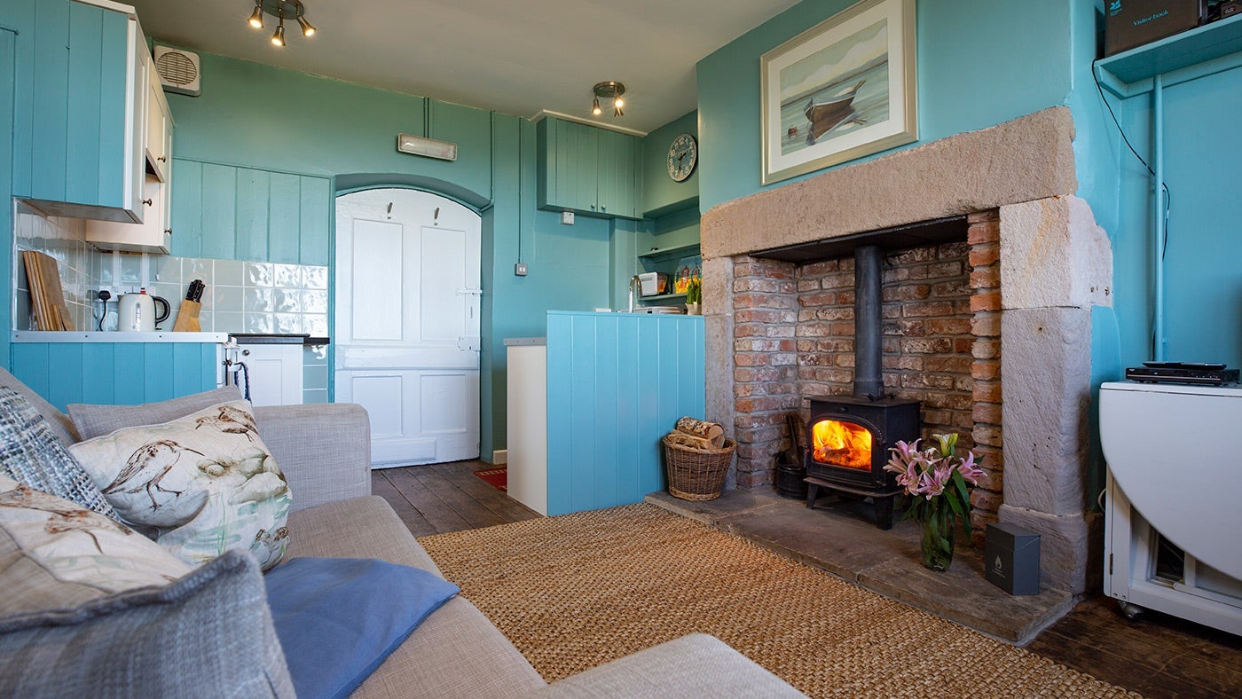 The sitting area and kitchen at Lookout Cottage, Alnwick, Northumberland