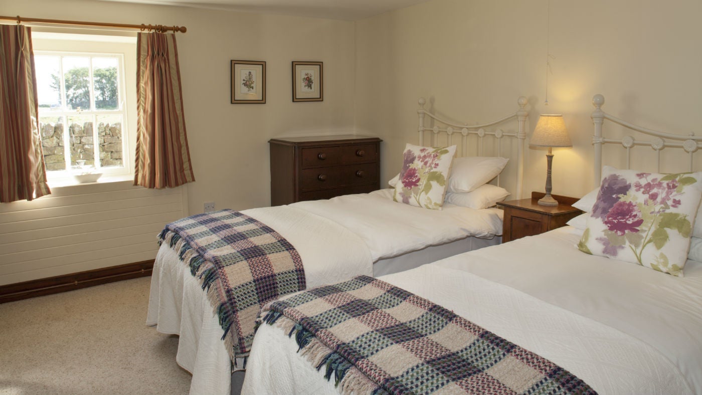 A twin bedroom at Springwell Cottage, nr Hexham, Northumberland