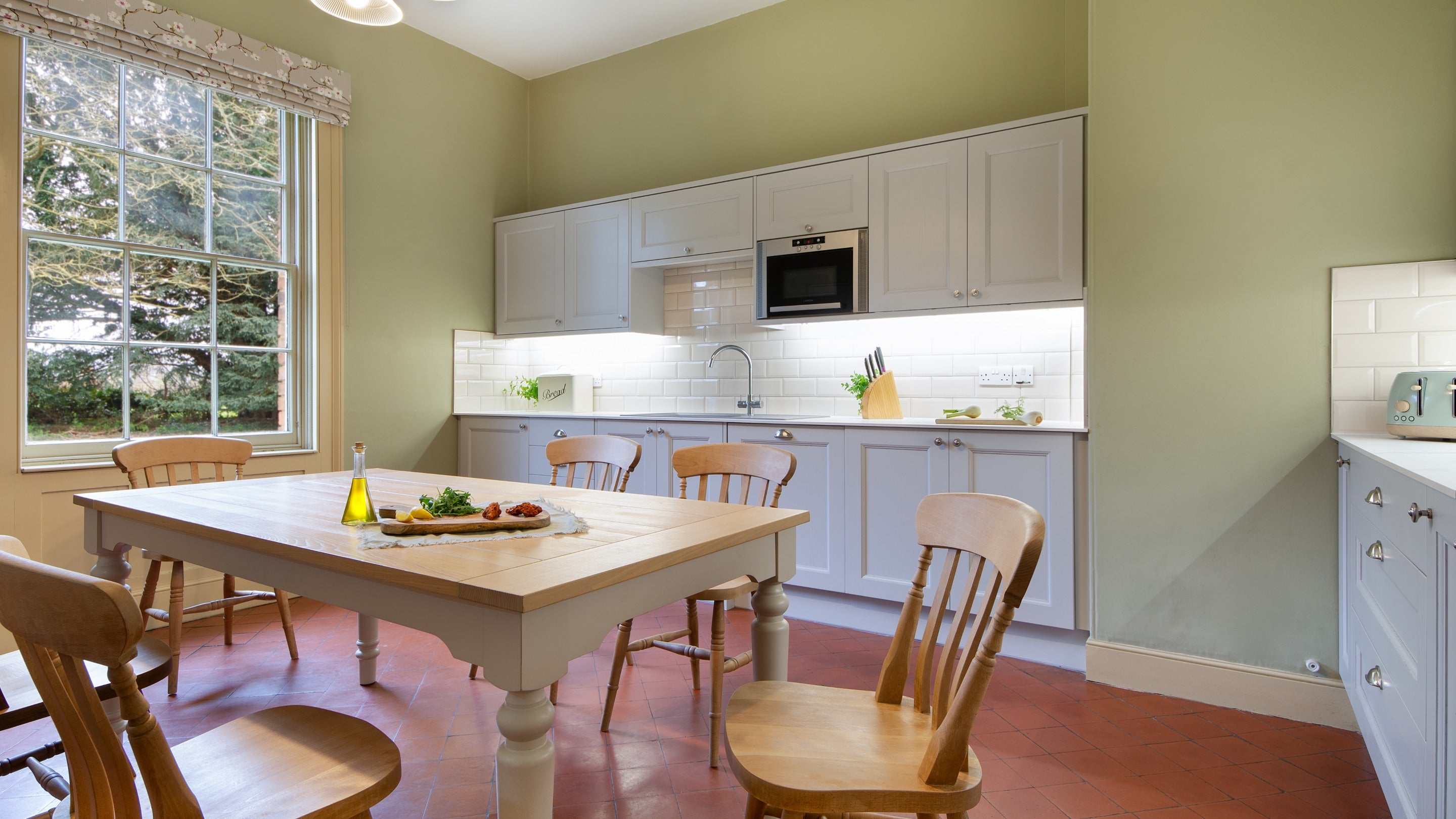 The kitchen with table for six at Gunby Old Rectory, Lincolnshire