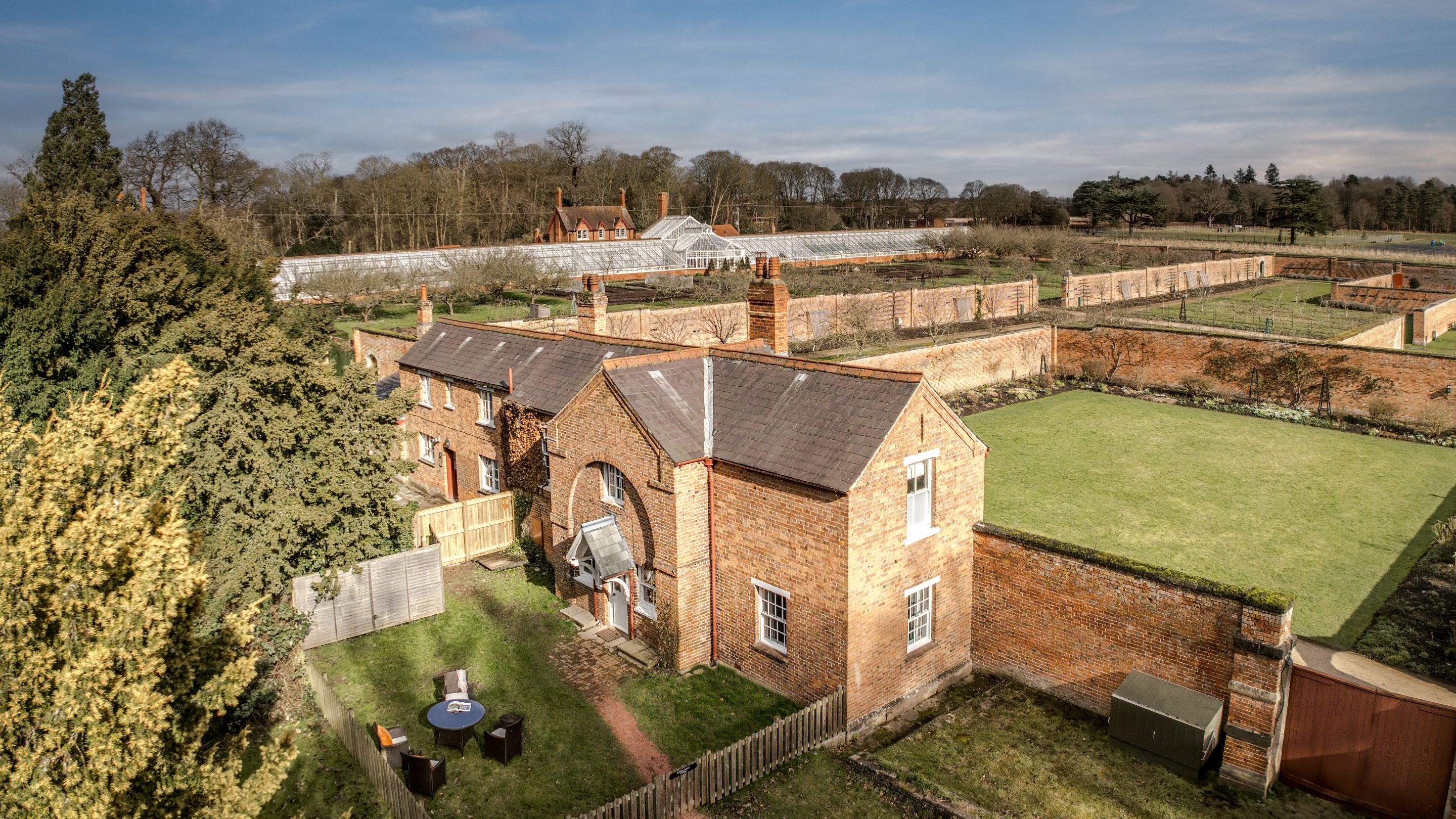 An aerial view of Kitchen Garden Cottage and the walled kitchen garden at Clumber Park, Nottinghamshire