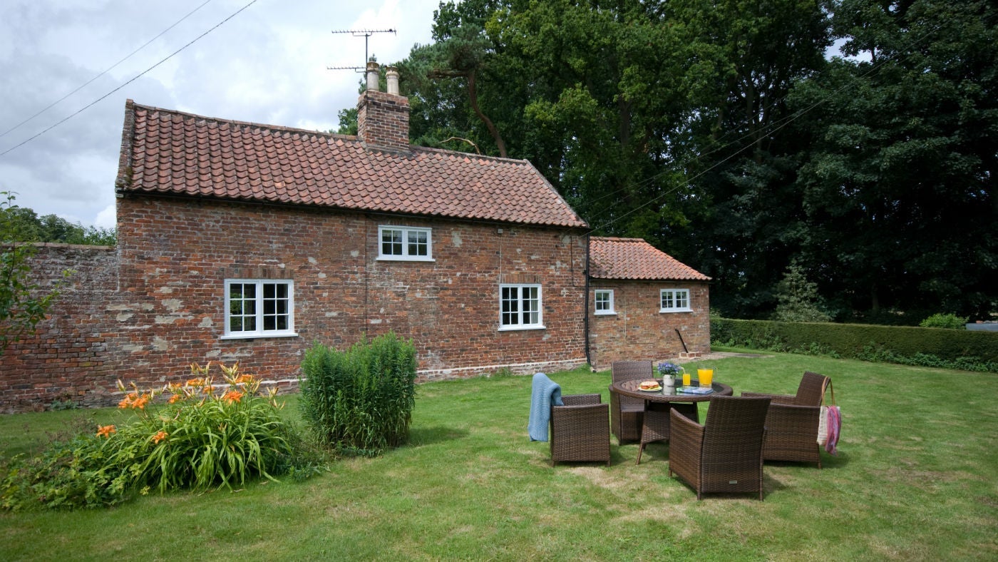 The pretty exterior of Orchard Cottage, Gunby Hall, nr Skegness, Lincolnshire