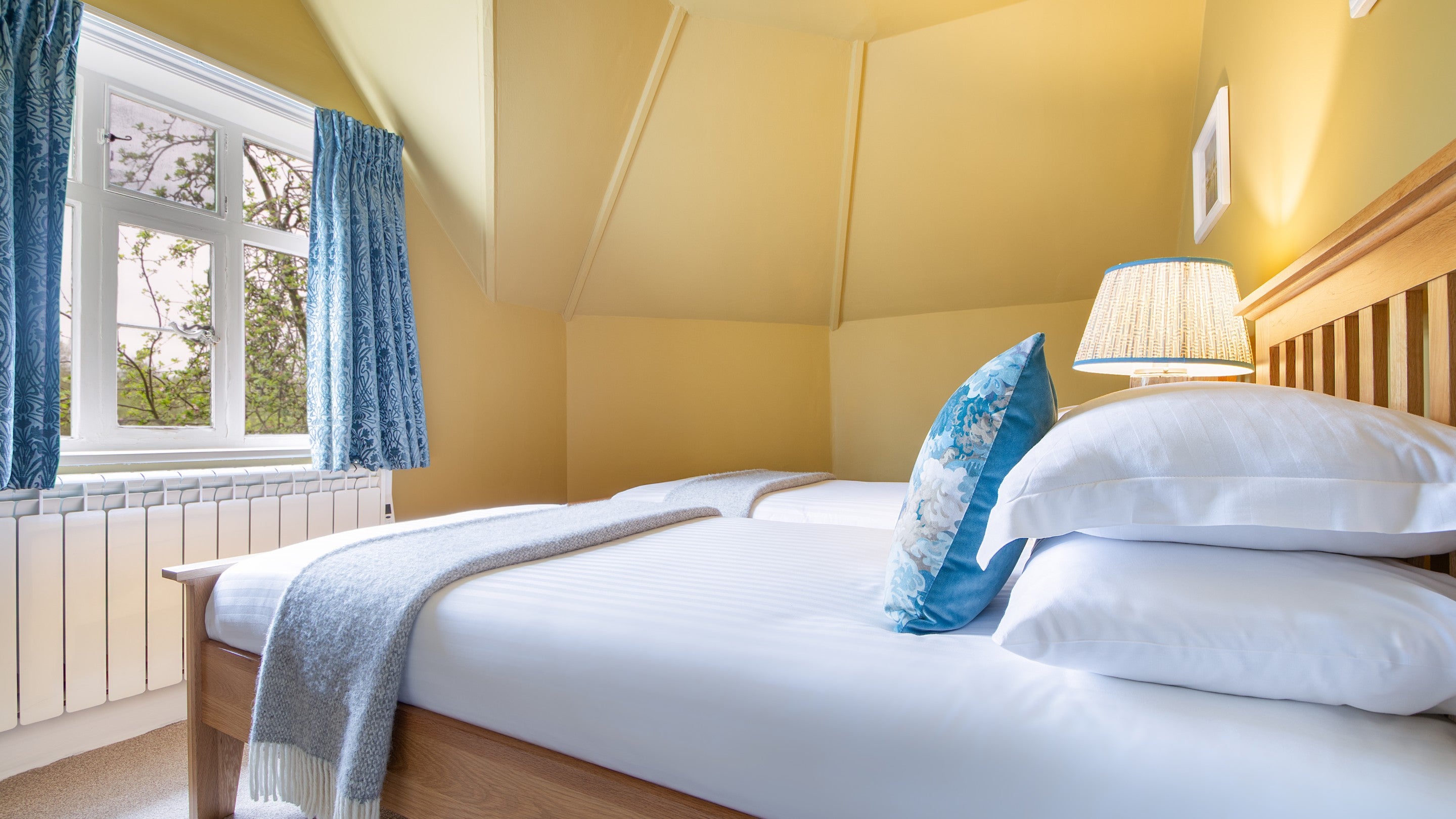 The twin bedroom at Cliveden New Cottage, Berkshire