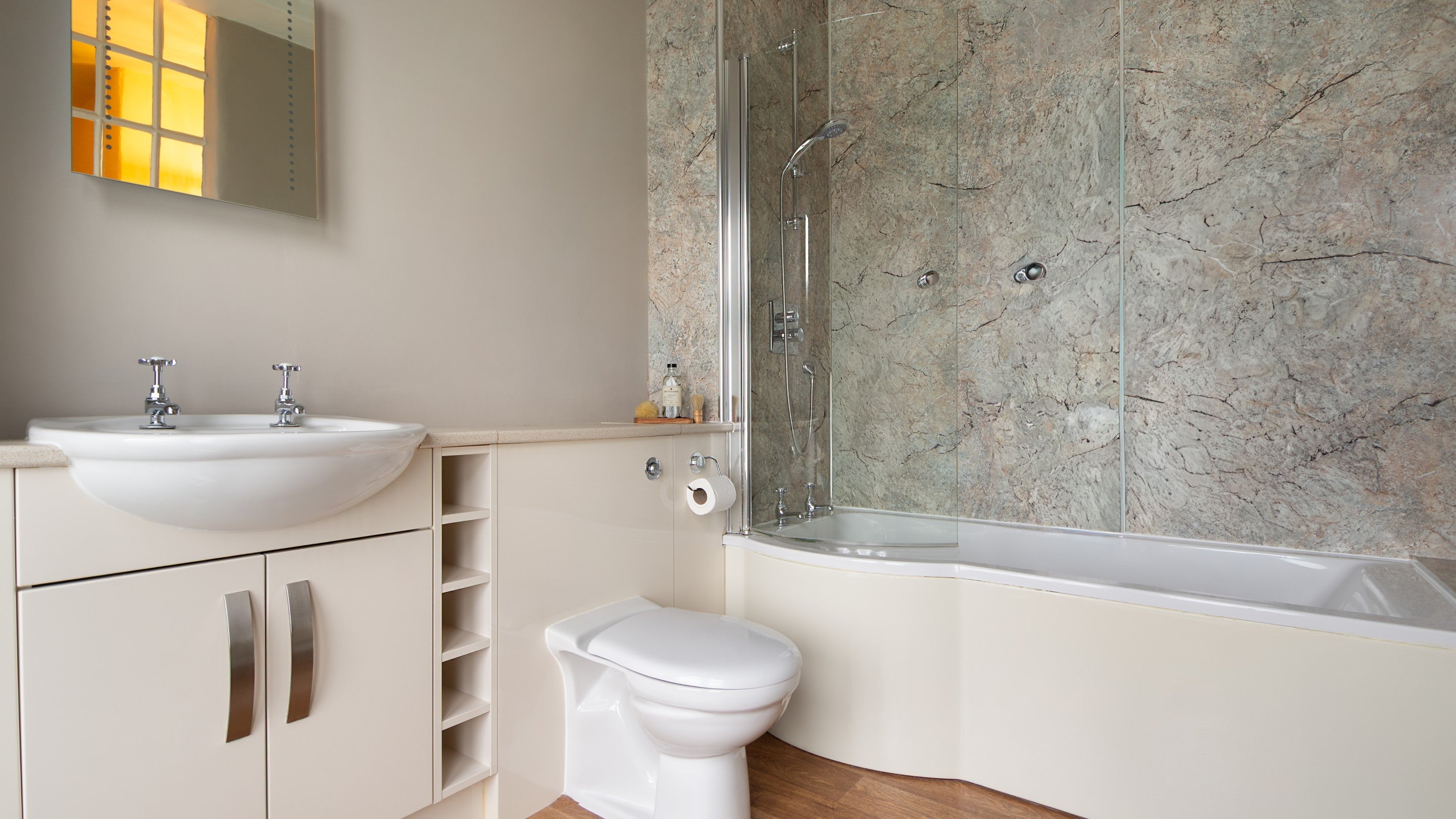 The bathroom with shower over bath at 4 Stable Yard Cottage, Derbyshire