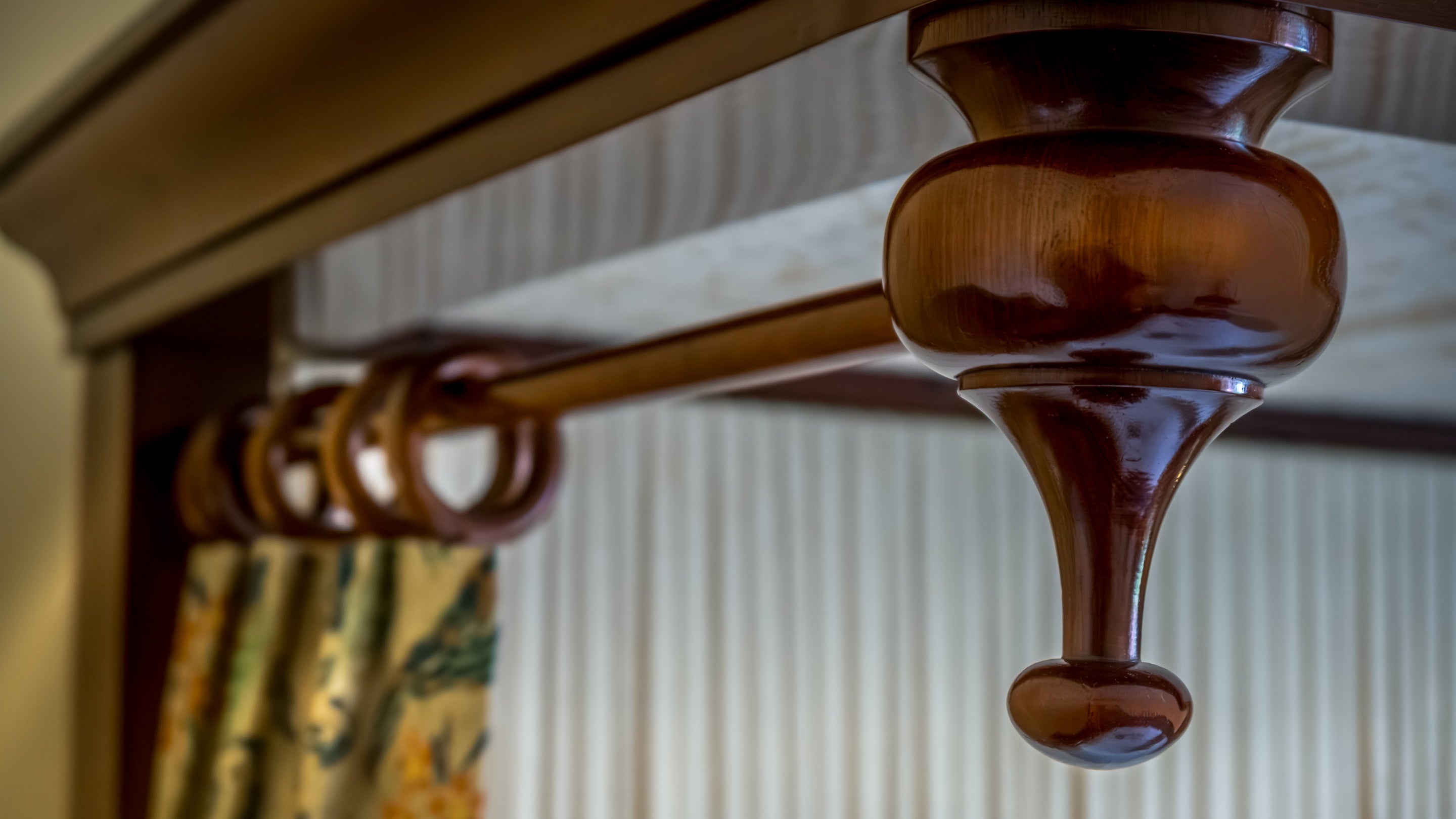 The canopy of the antique mahogany half tester bed at 4 Stable Yard Cottage, Derbyshire