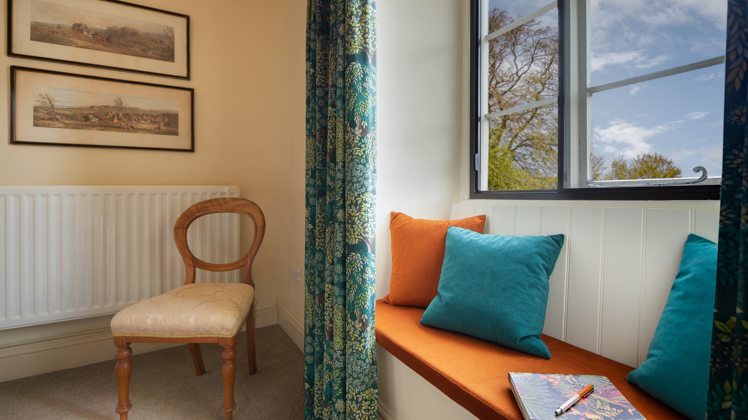 The window seat in the double bedroom with brass bed at 4 Stable Yard Cottage, Derbyshire