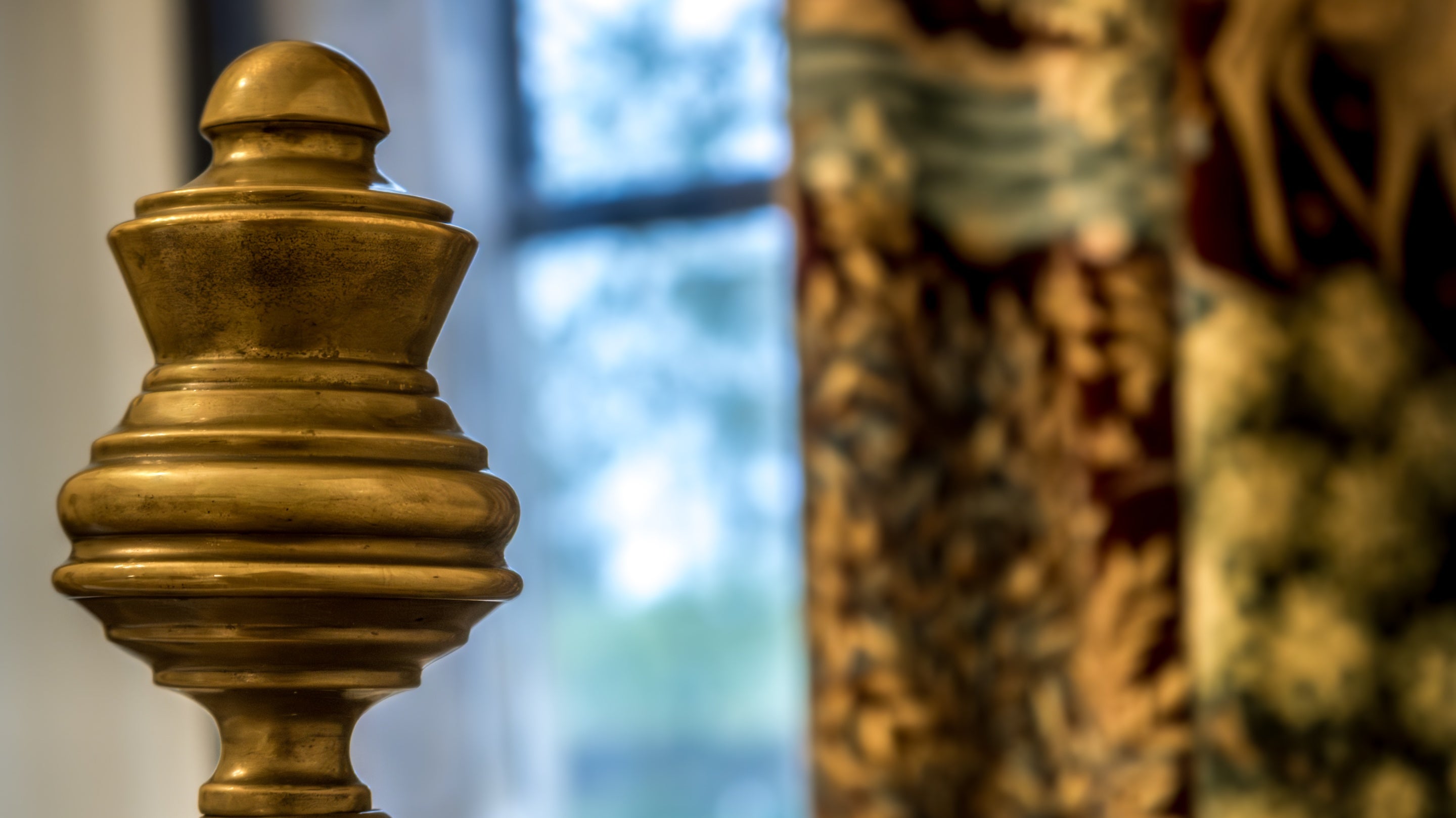 Details of the brass bed in one of the double bedrooms on the first floor of 6 High Hazels, Derbyshire
