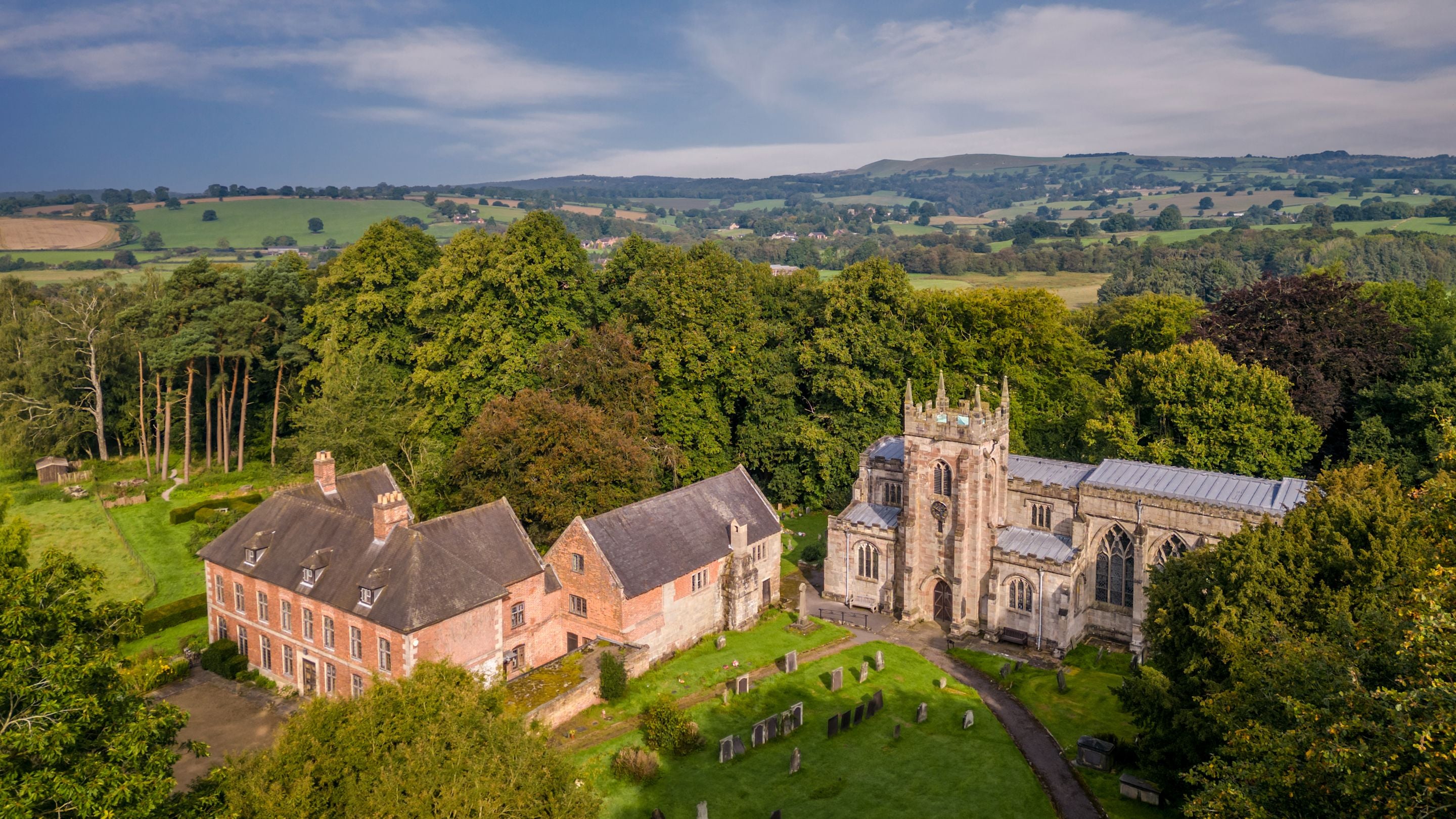 An aerial view of Norbury Manor and the neighbouring church, Derbyshire
