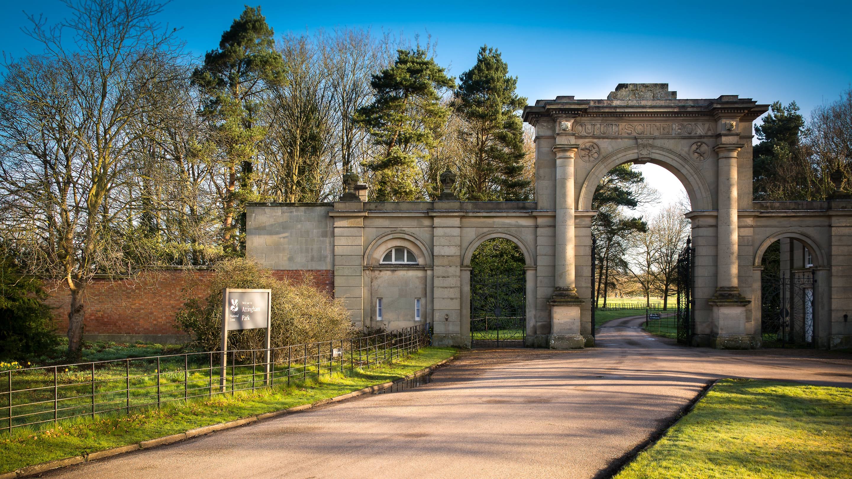 The approach to the entrance gates and Attingham East Lodge, Shropshire