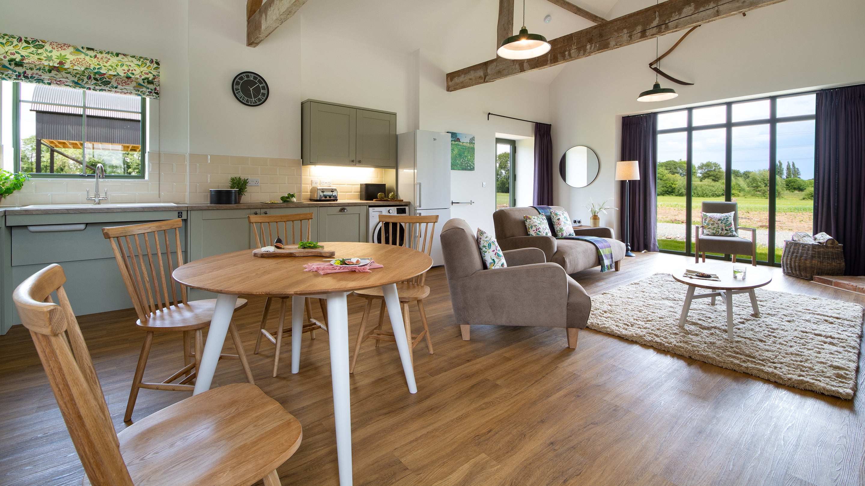 The open plan kitchen, sitting and dining room at Forge Barn, Shropshire