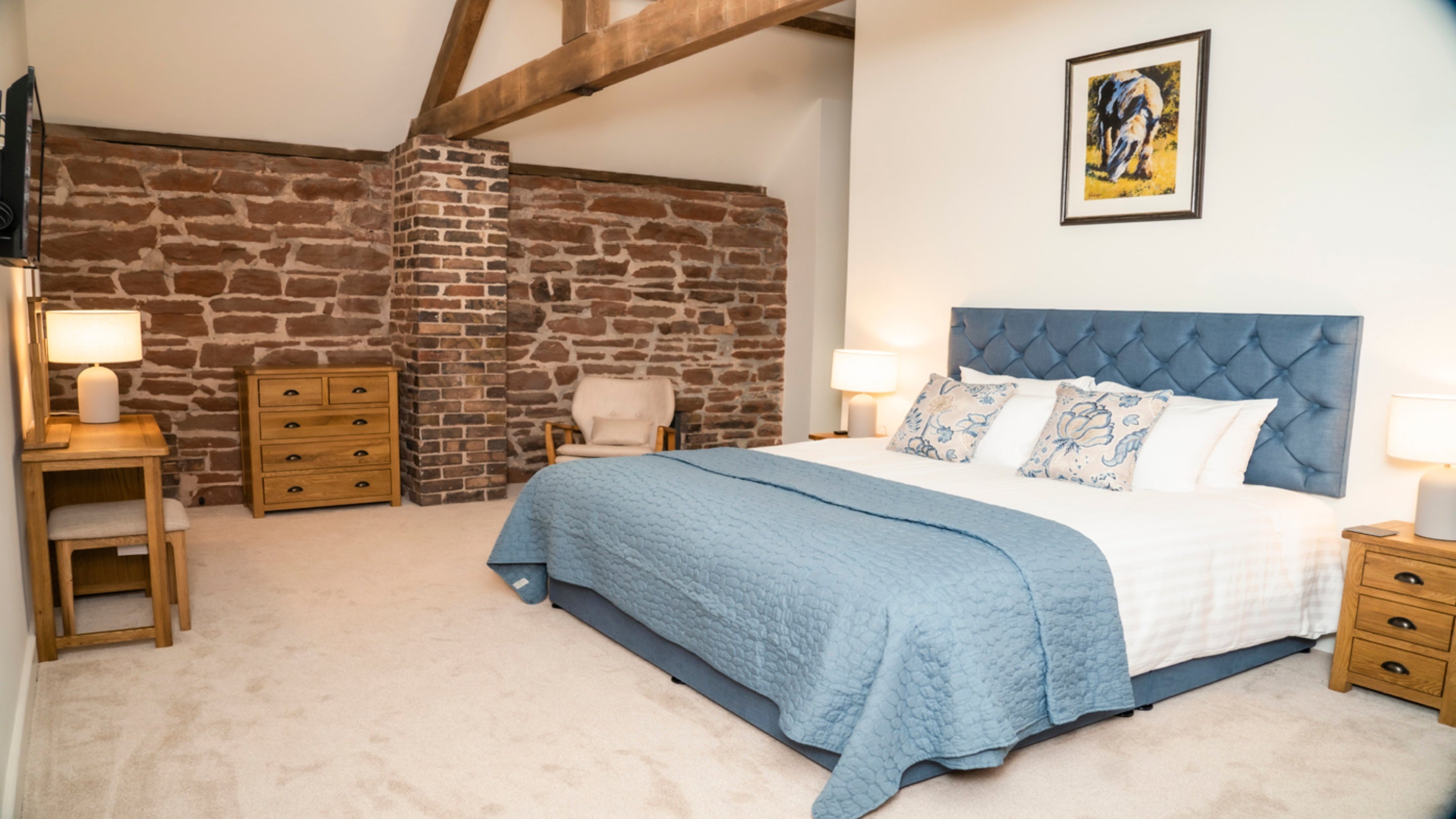 The super king-size bedroom on the first floor of Sandybury Barn, Shropshire