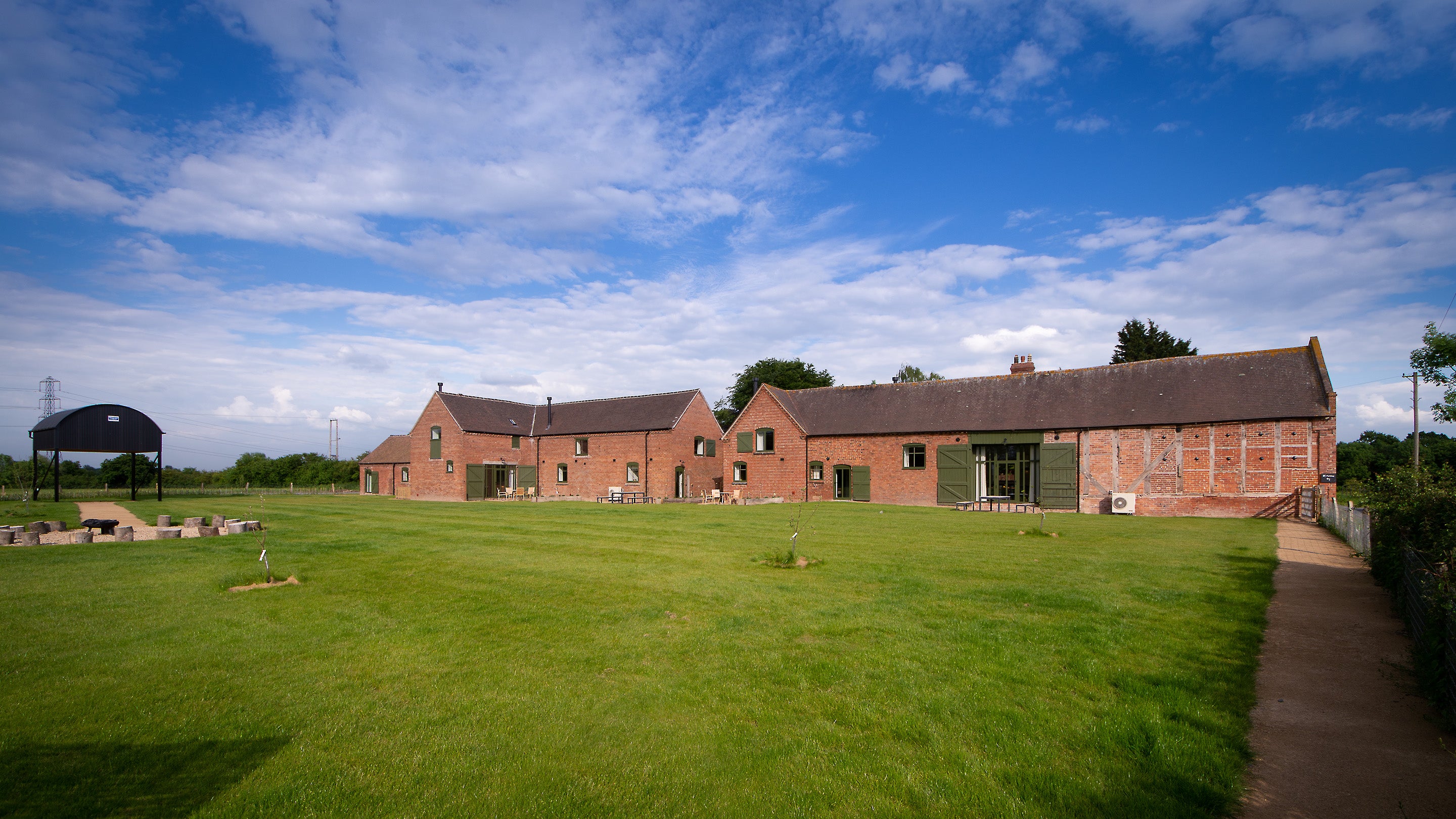 The exterior and shared garden of Berwick Barns, Shropshire