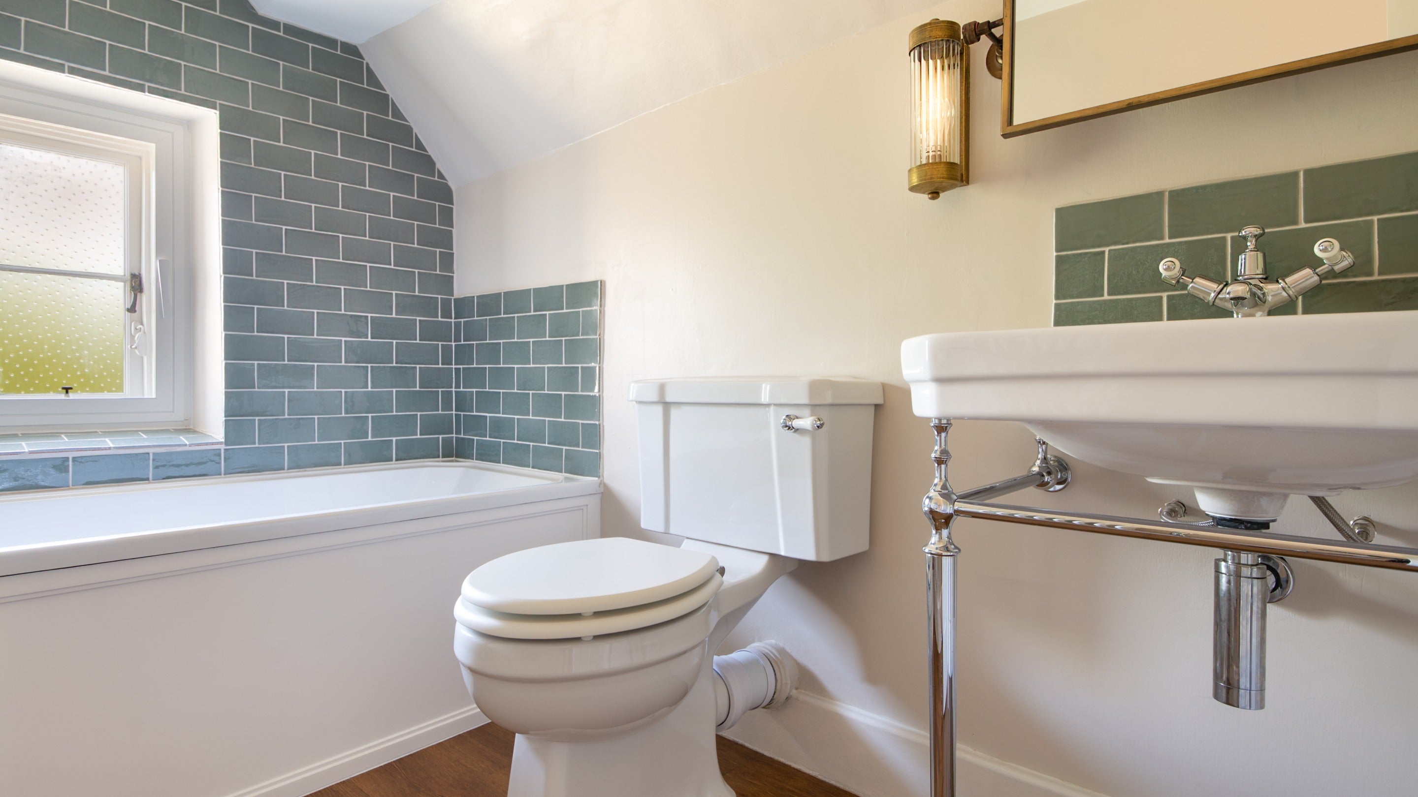The bathroom with shower over bath at 20 Church Street, Wiltshire