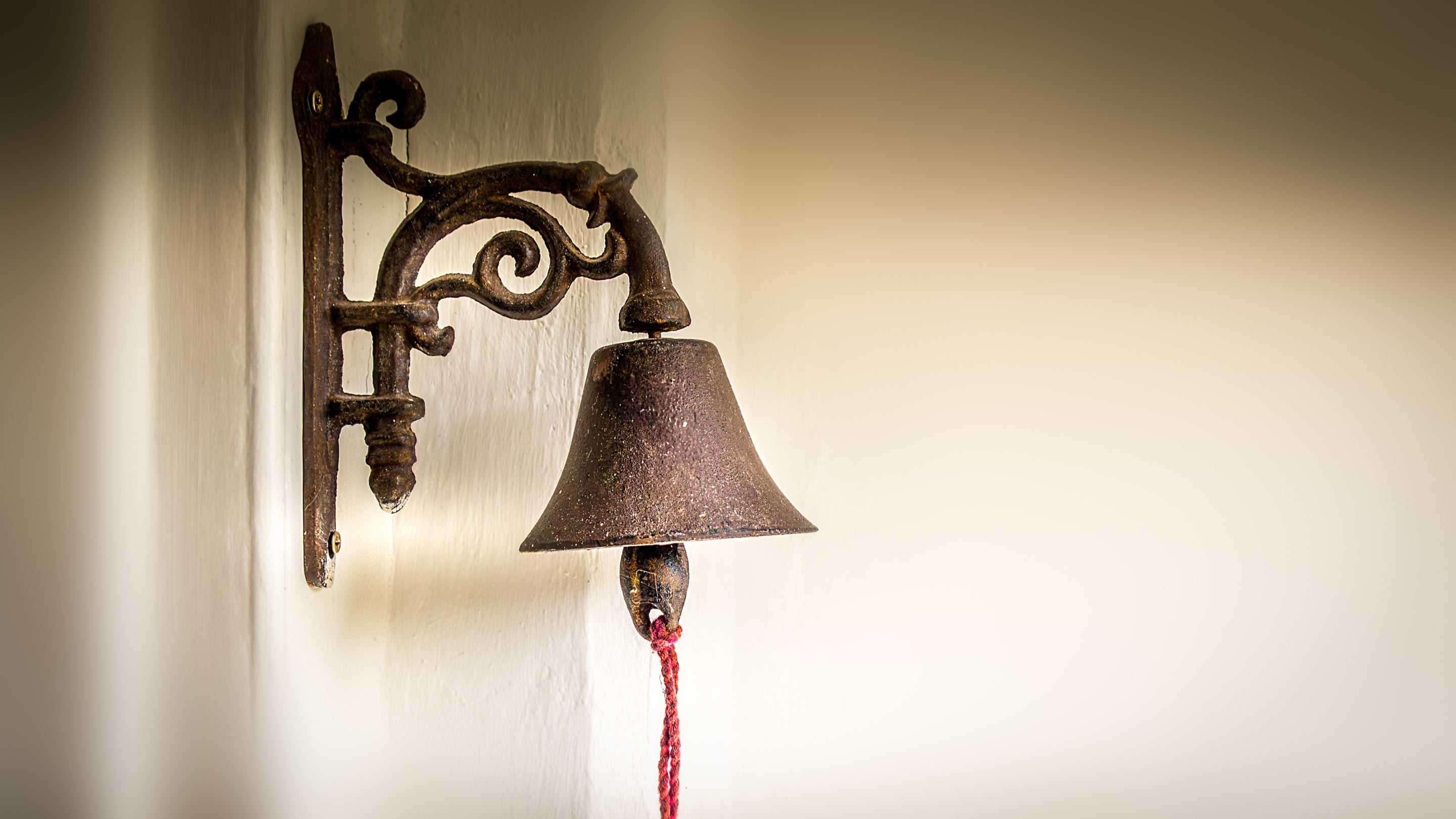 The old bell in the porch at 20 Church Street, Wiltshire
