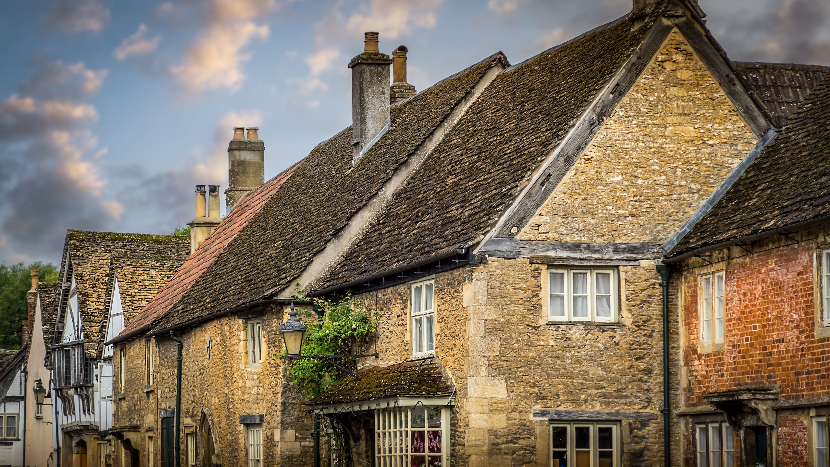 A terrace of stone cottages in Lacock village, Wiltshire
