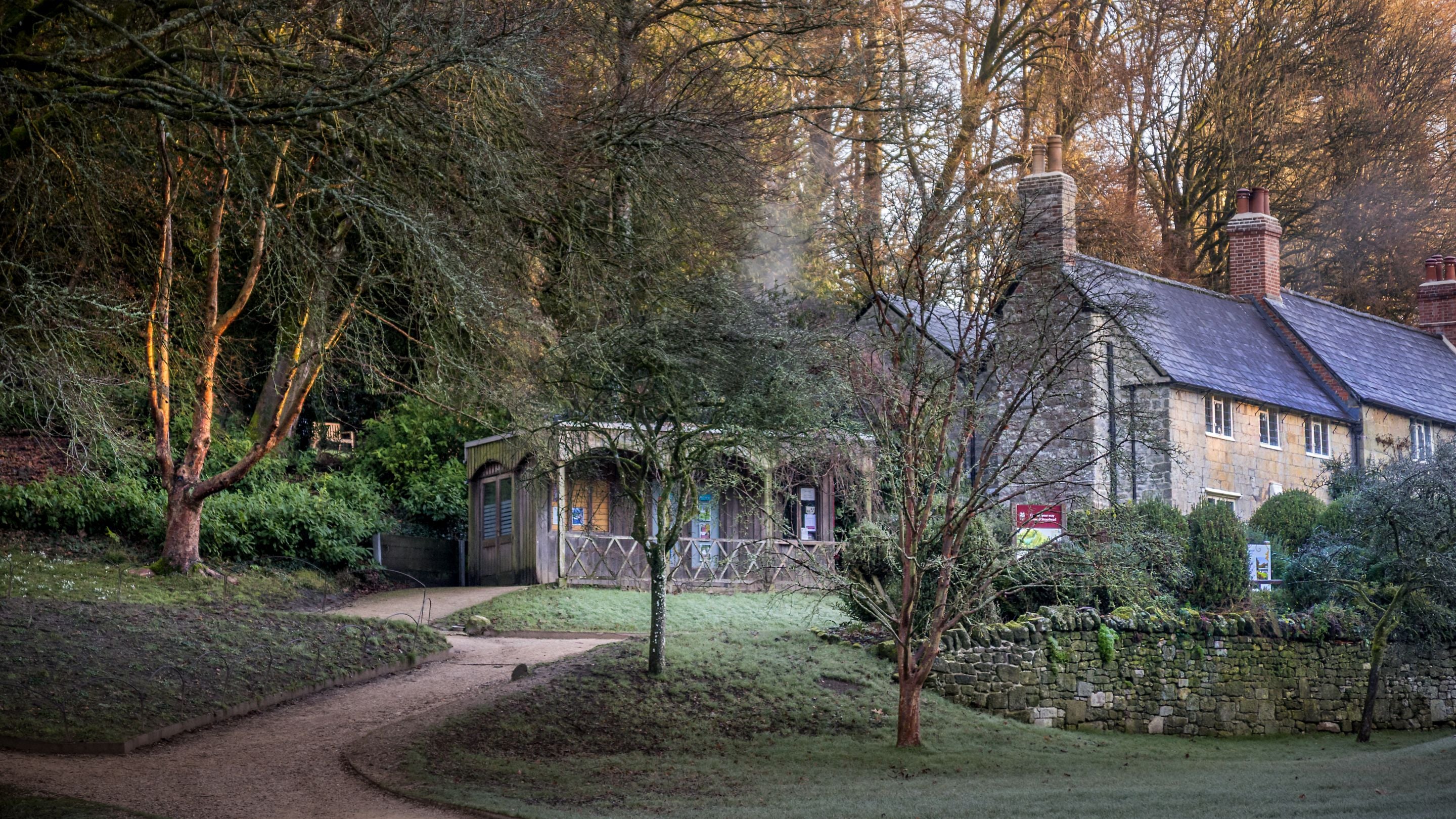 The entrance to Stourhead's garden, with 89 Church Lawn in the background, Wiltshire