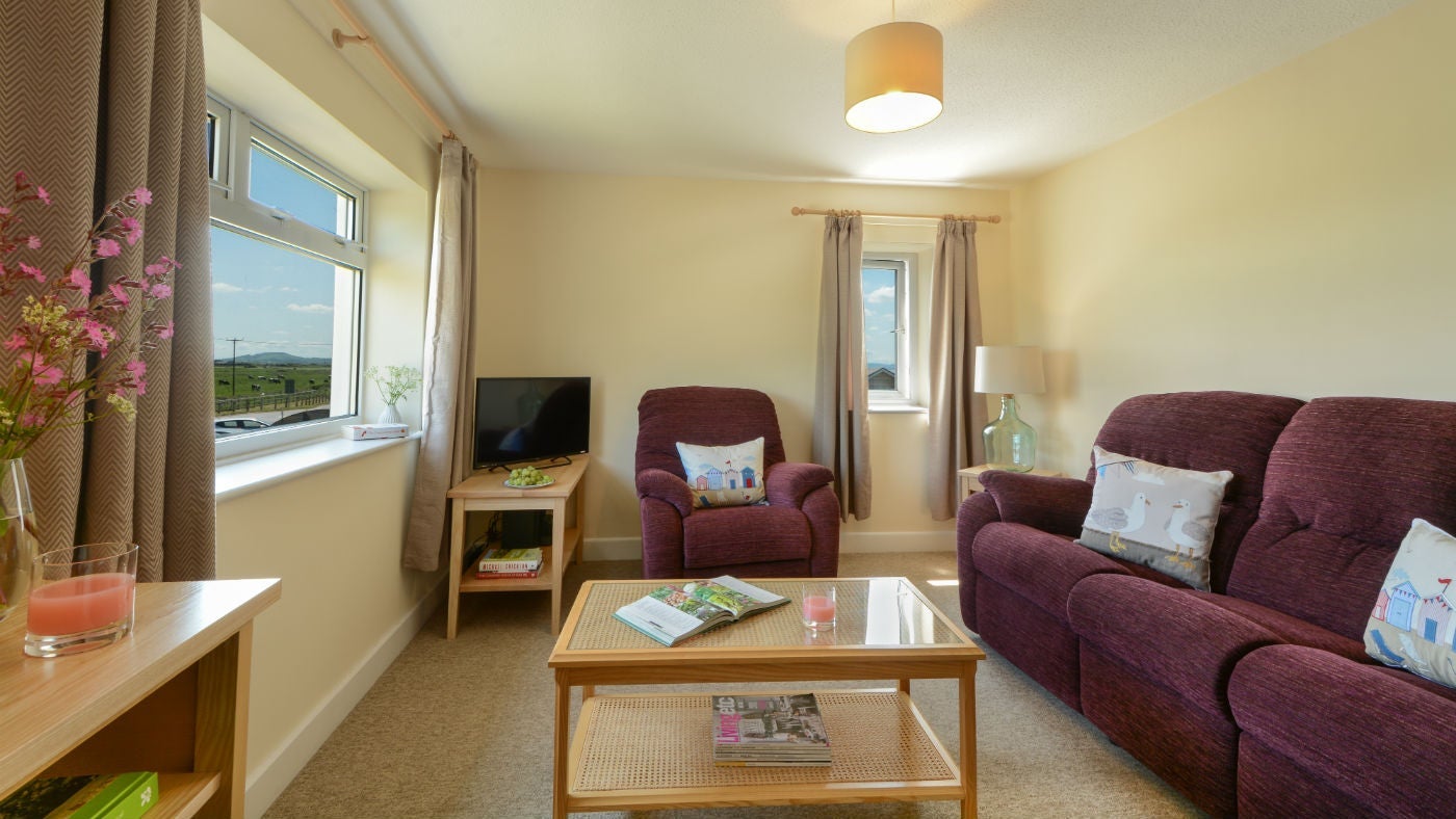 The cosy sitting room at Brean Cove Apartment, Burnham-on-Sea, North Somerset