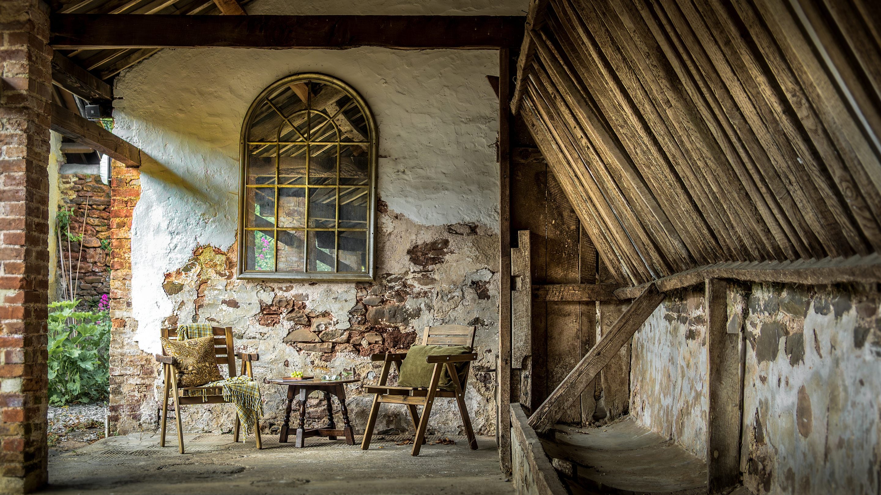 The covered outdoor seating area at Cross Lane House, Somerset