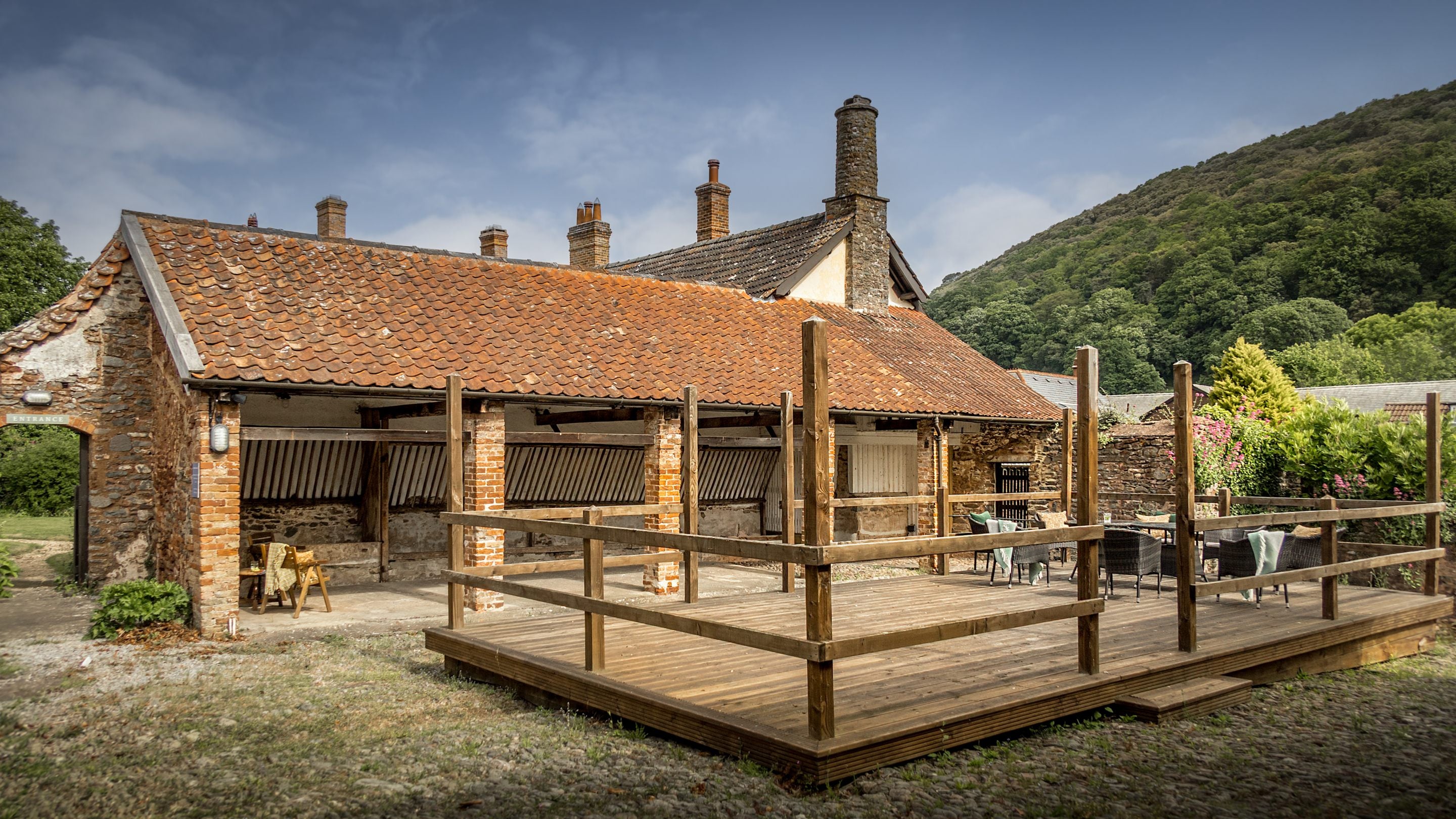 The decking and covered barn area at Cross Lane House, Somerset