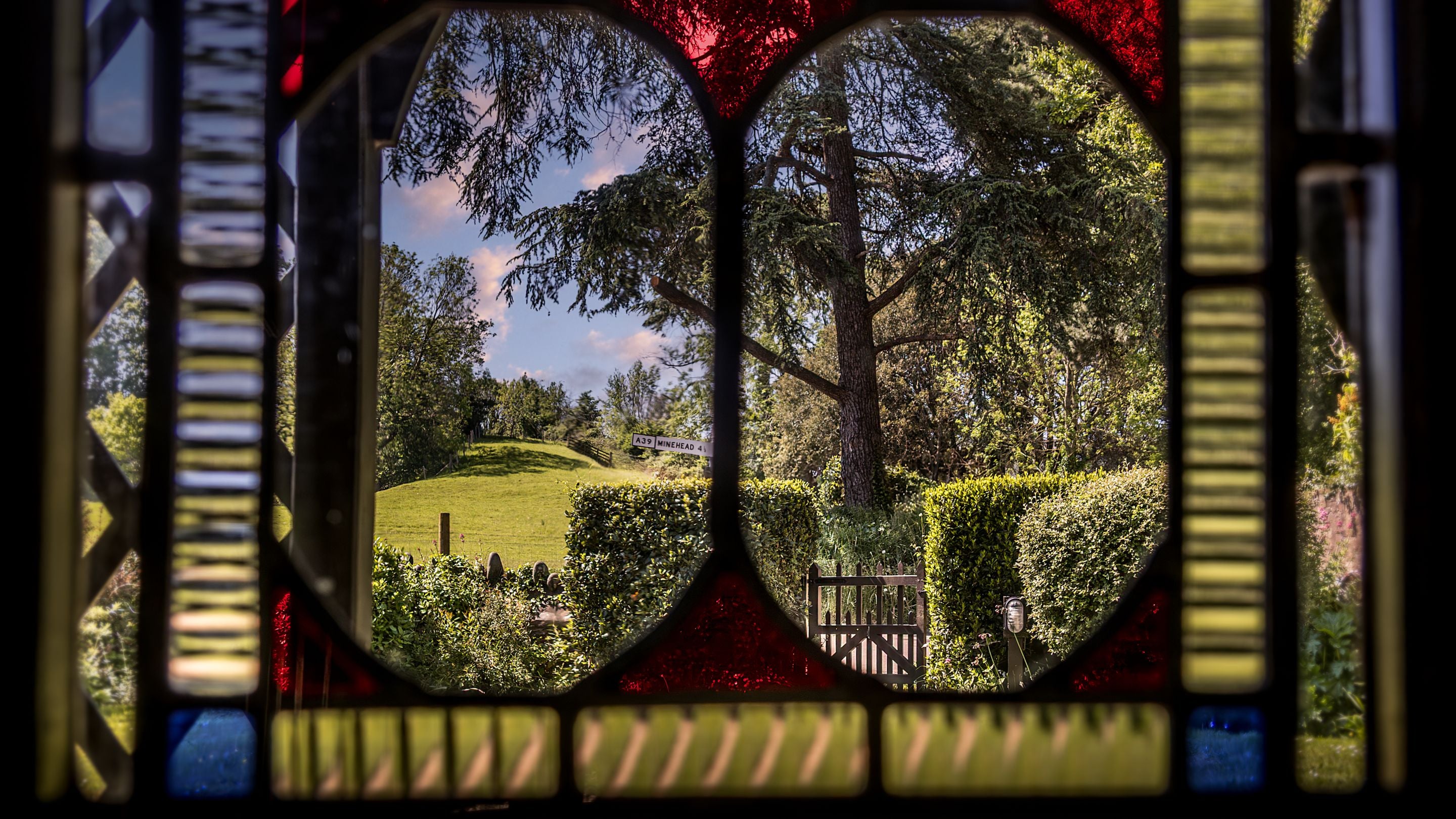 The stained glass in the front door at Cross Lane House, Somerset