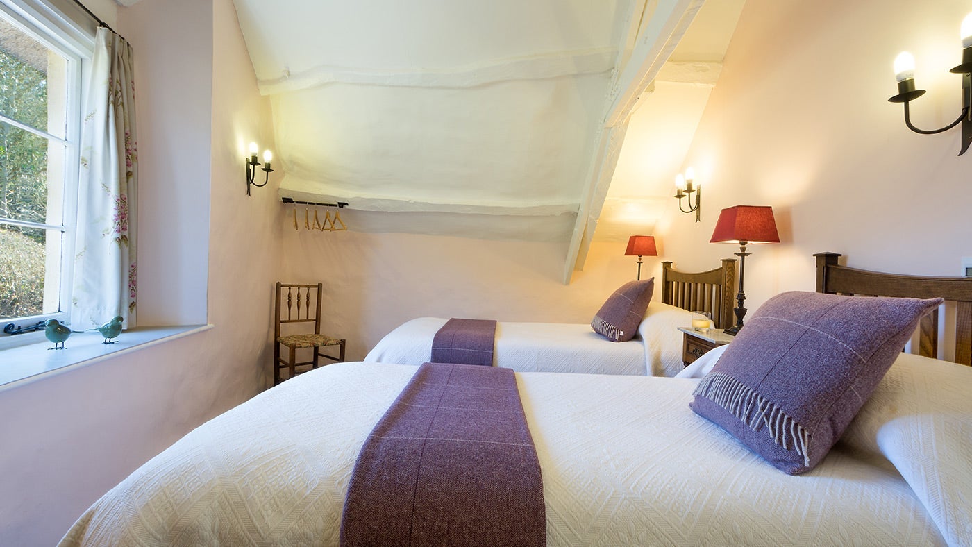 The cheery twin bedroom at Dunkery View, Minehead, Somerset