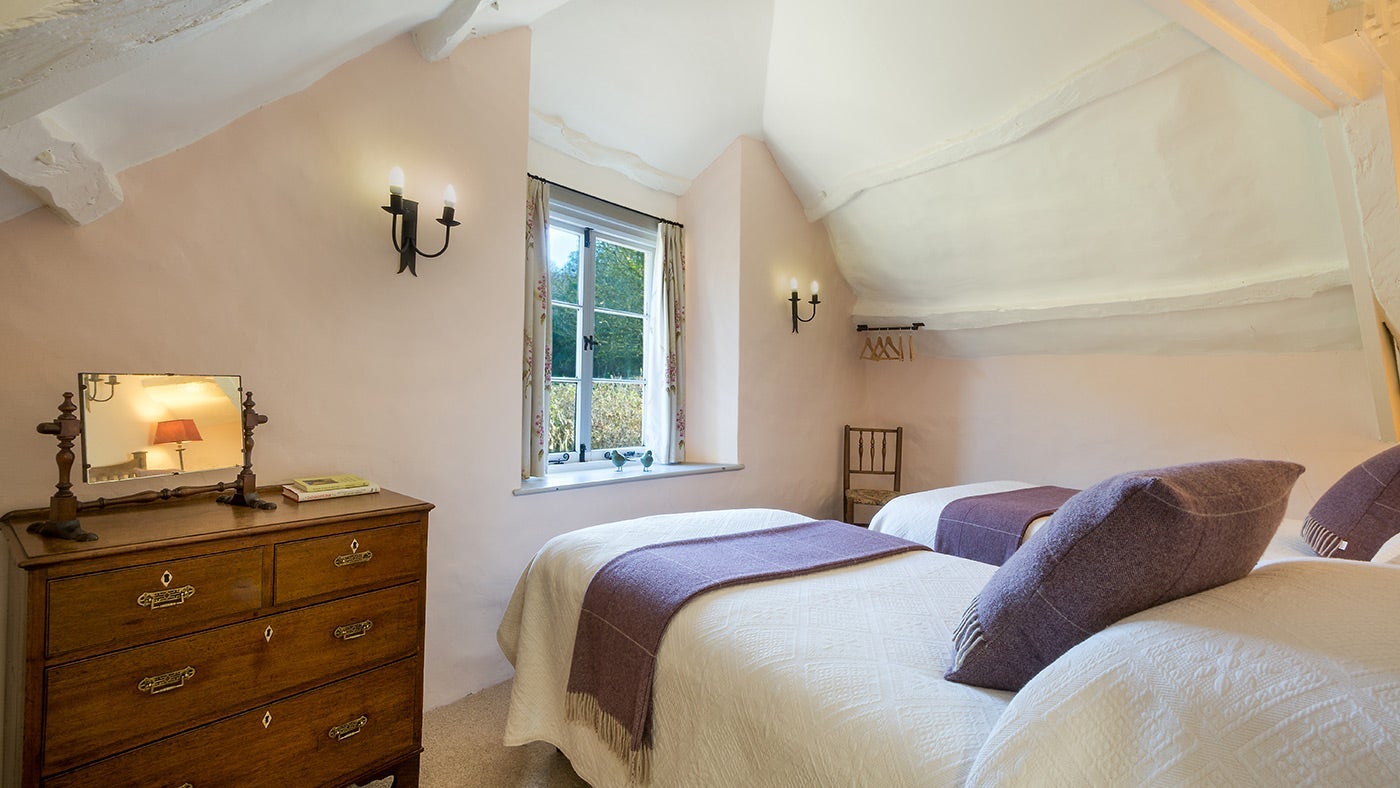 The cheery twin bedroom at Dunkery View, Minehead, Somerset