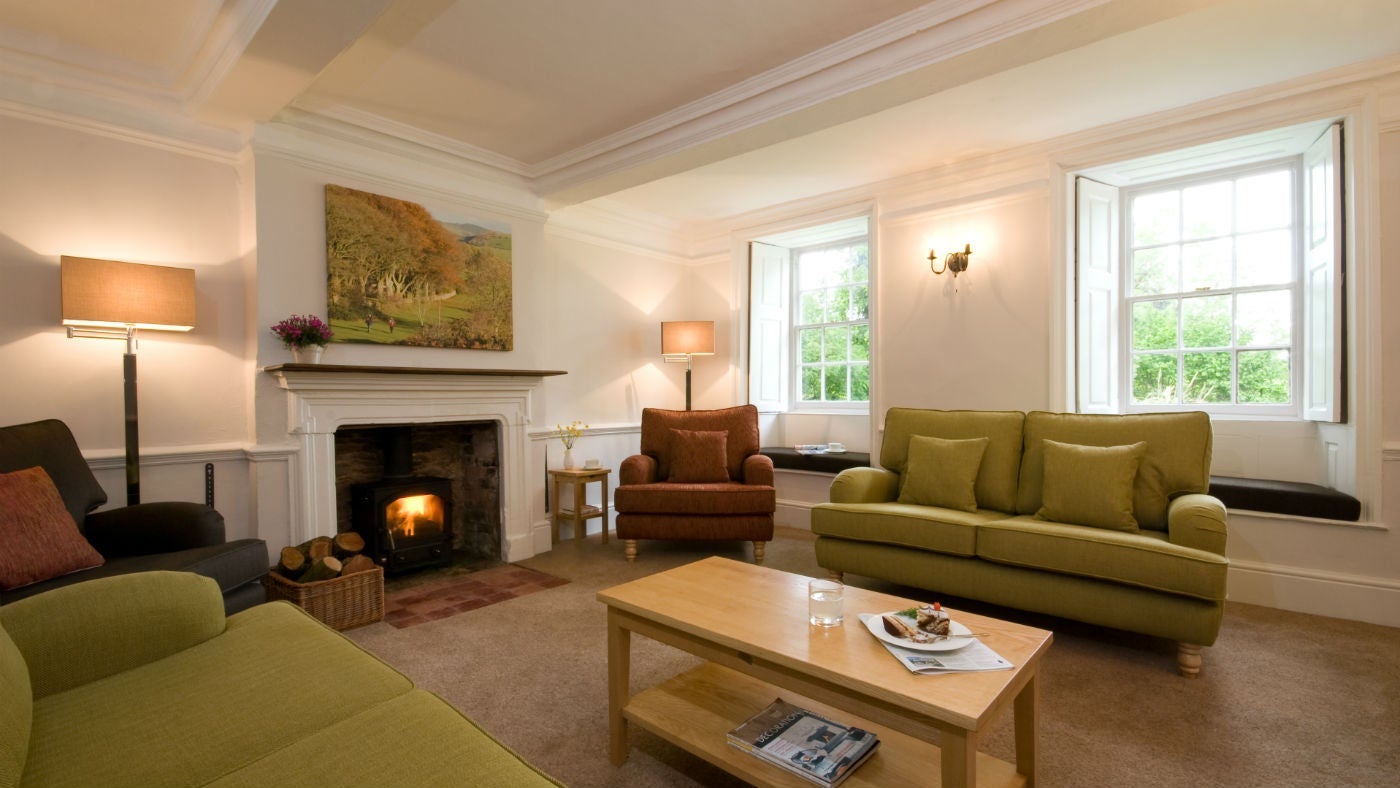 The cosy sitting room at Fyne Court Cottage, The Quantocks, Somerset
