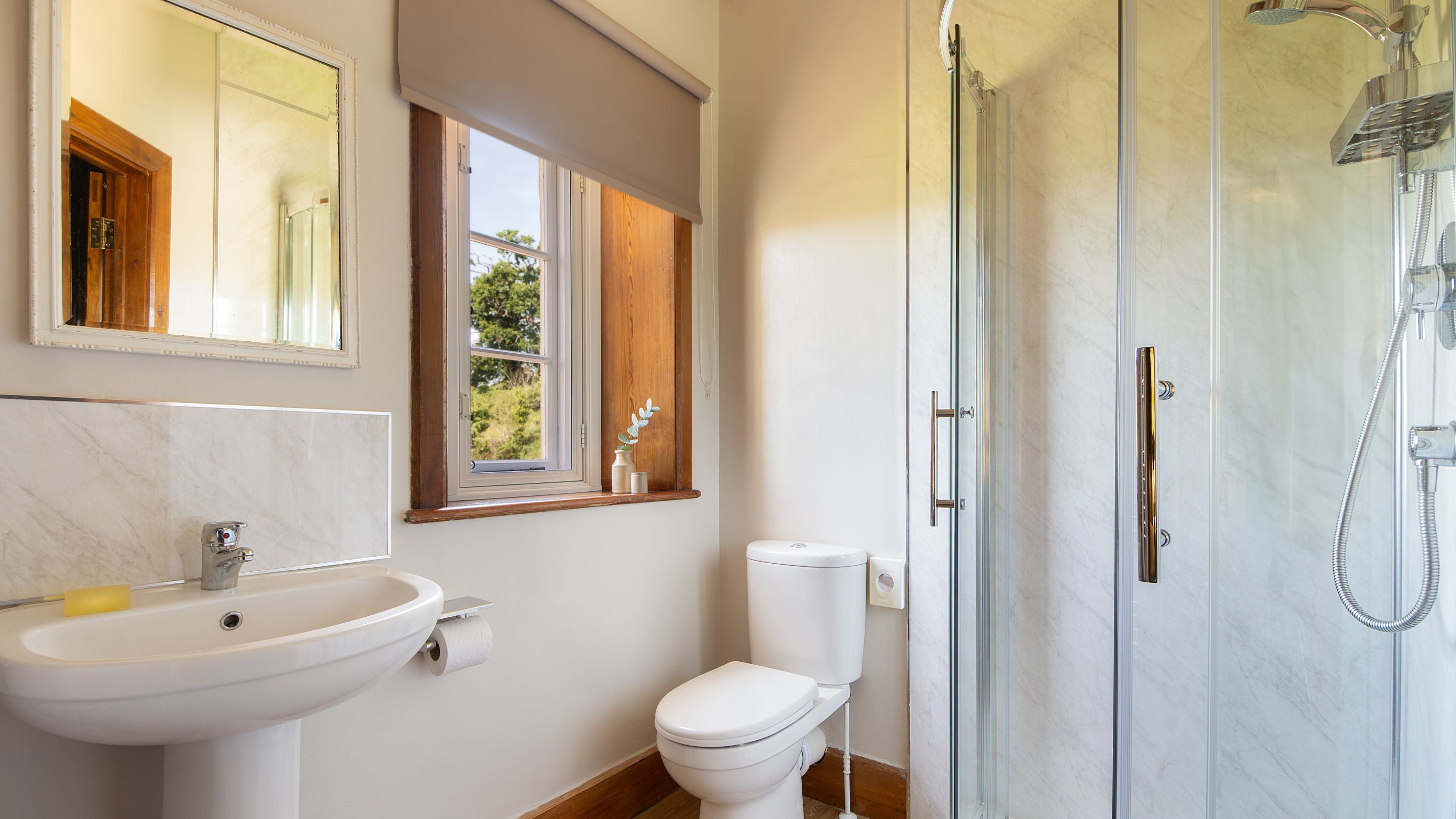 The en-suite shower room to the second double bedroom at Selworthy Farmhouse, Somerset