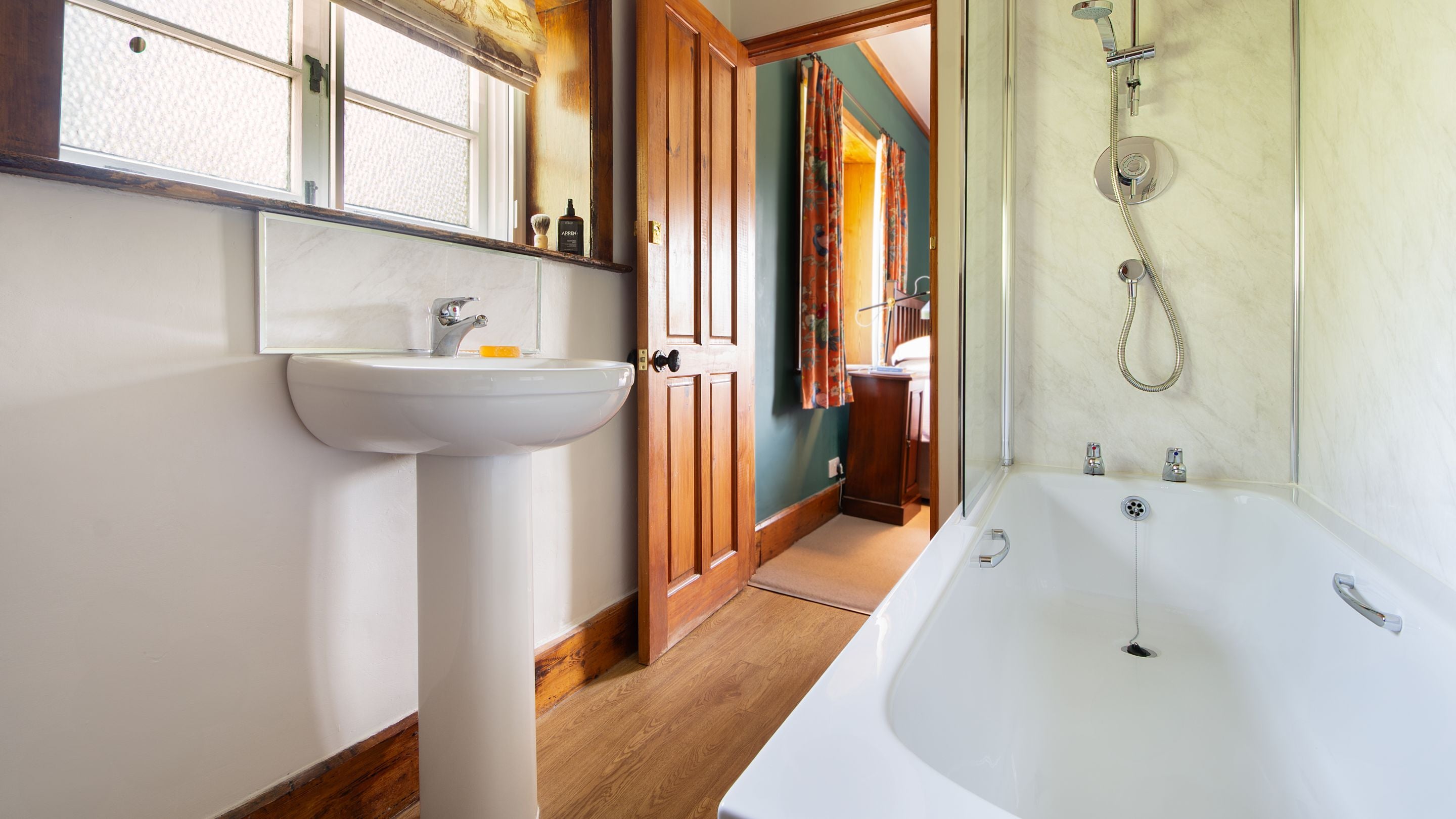 The en-suite bathroom for the first double bedroom at Selworthy Farmhouse, Somerset
