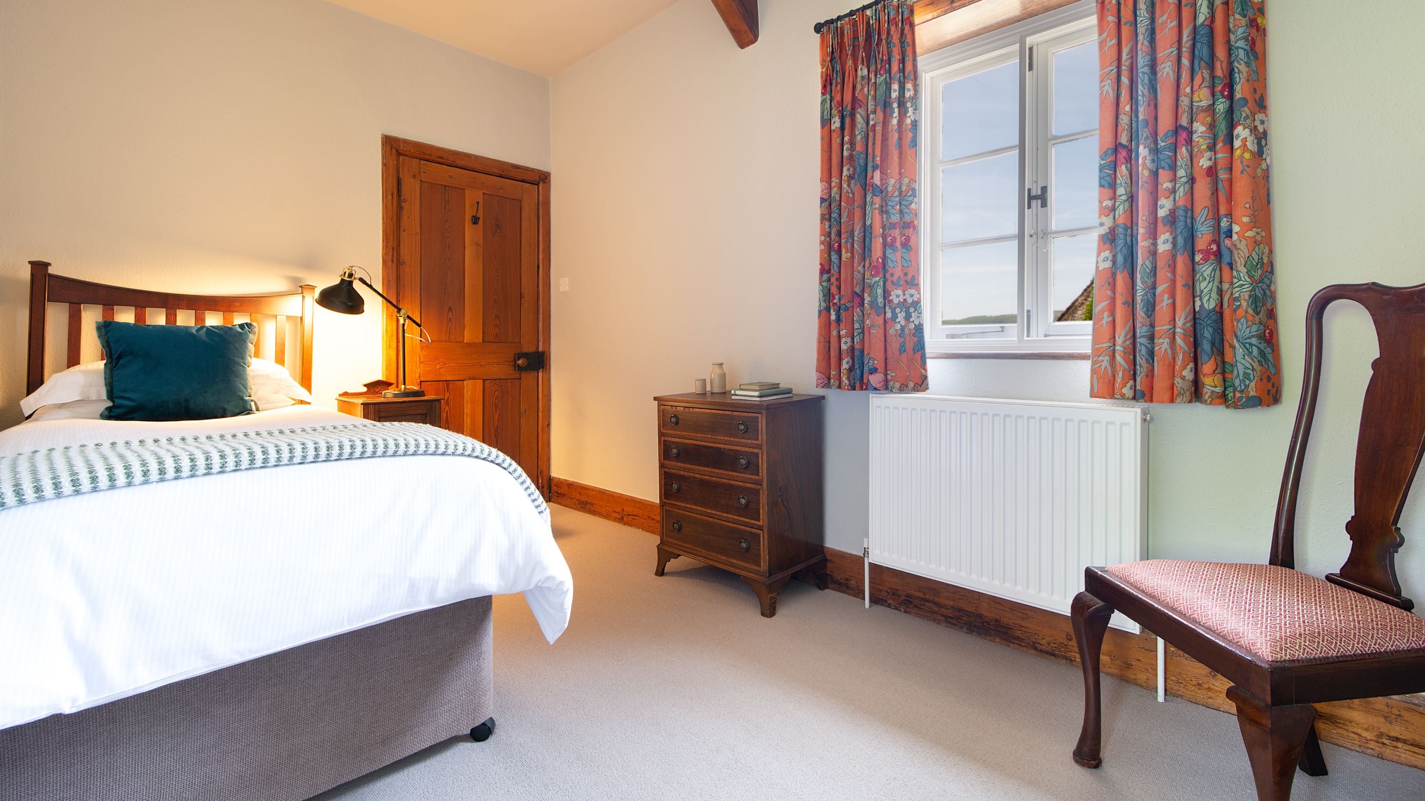 The single bedroom - which has an en-suite bathroom - at Selworthy Farmhouse, Somerset