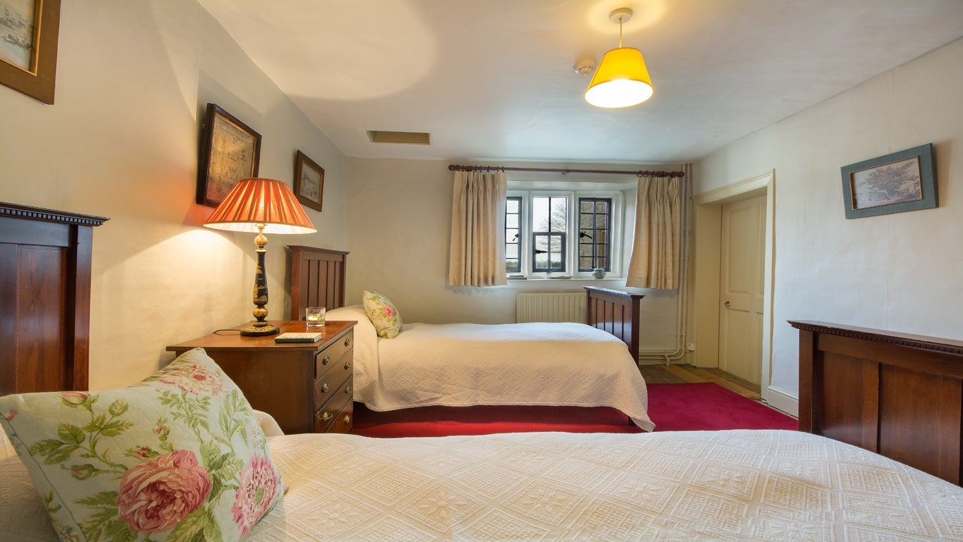 One of the large twin bedrooms at Tintinhull House, Yeovil, Somerset