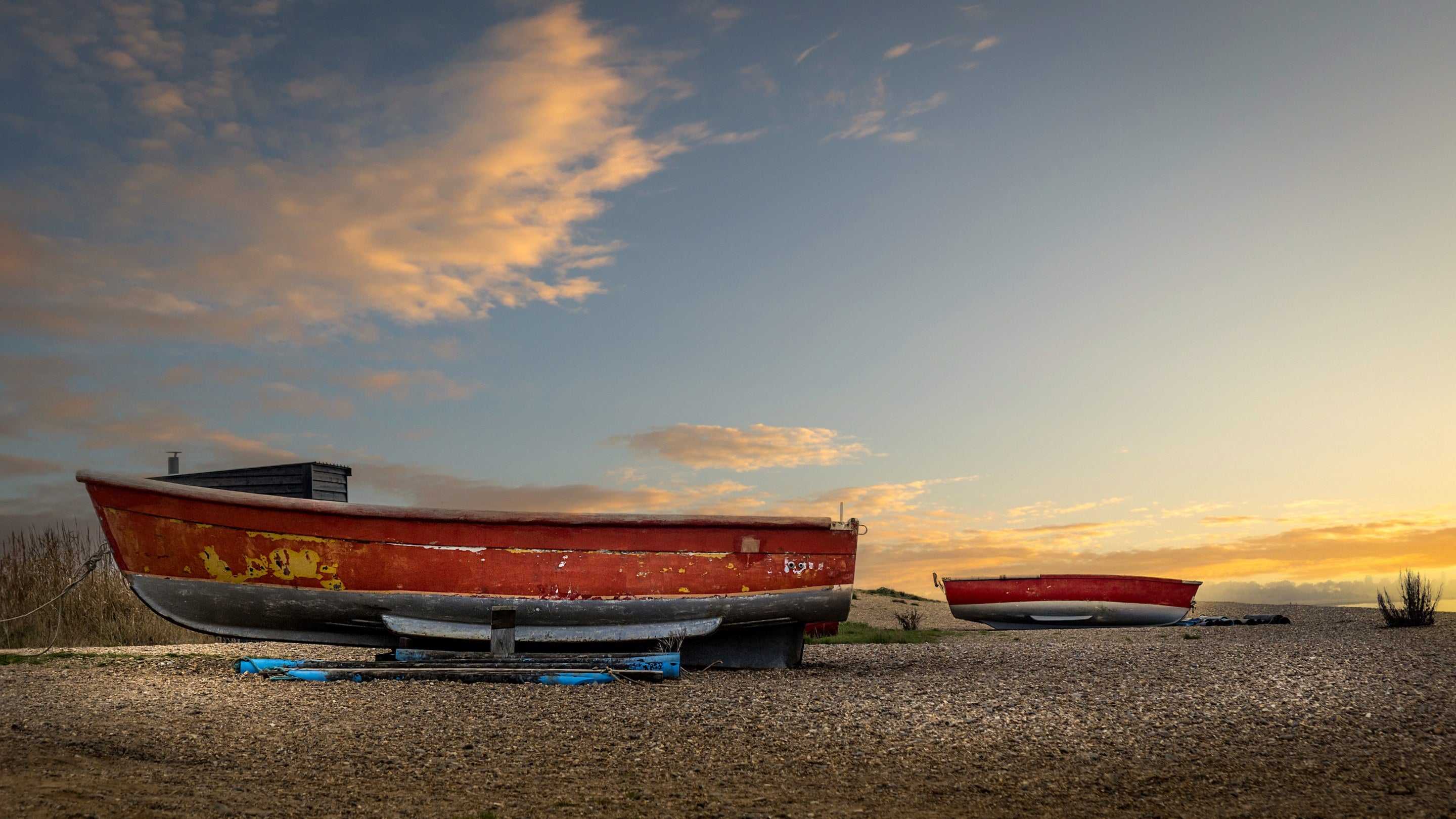 Boats on Dunwich Beach, a shingle beach near Bridge Farm Cottage, Suffolk