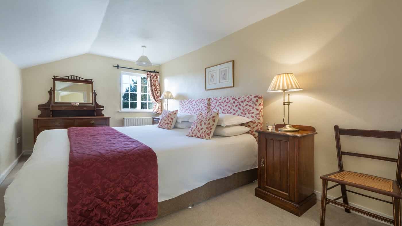 A large interior double bedroom at Gardens House, Bury St Edmunds, Suffolk