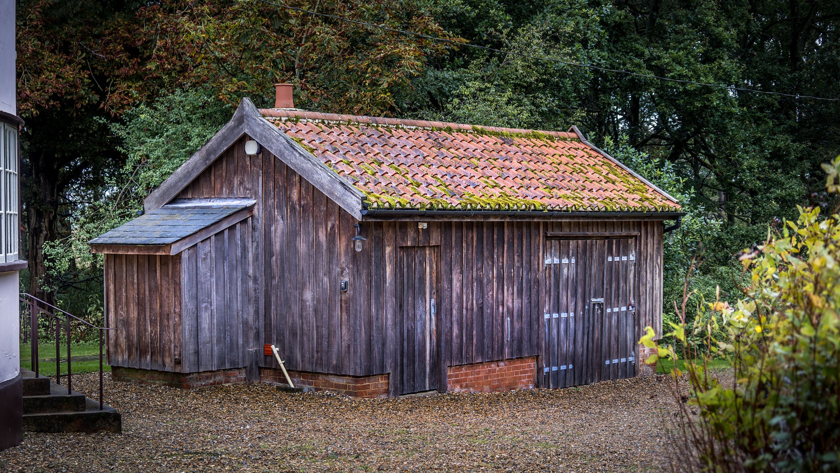 The outbuildings, storing the washing machine and tumble dryer, at The Round House, Suffolk