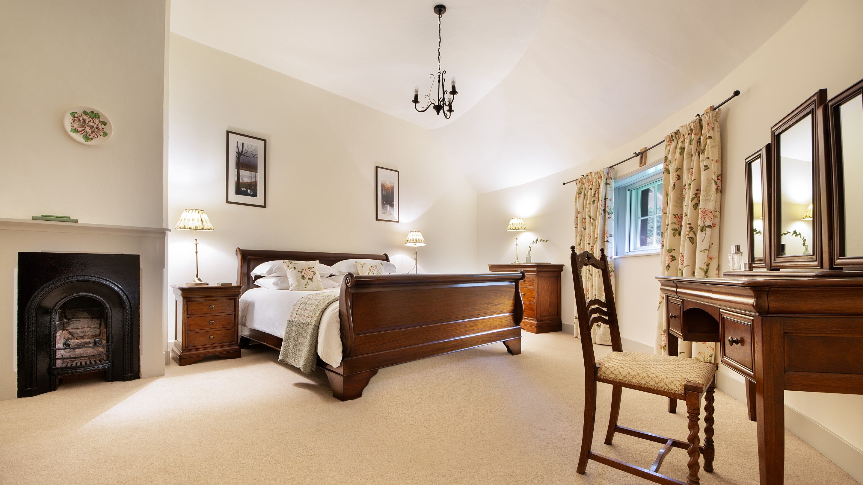 One of the double bedrooms at The Round House, with a curved outer wall, Suffolk