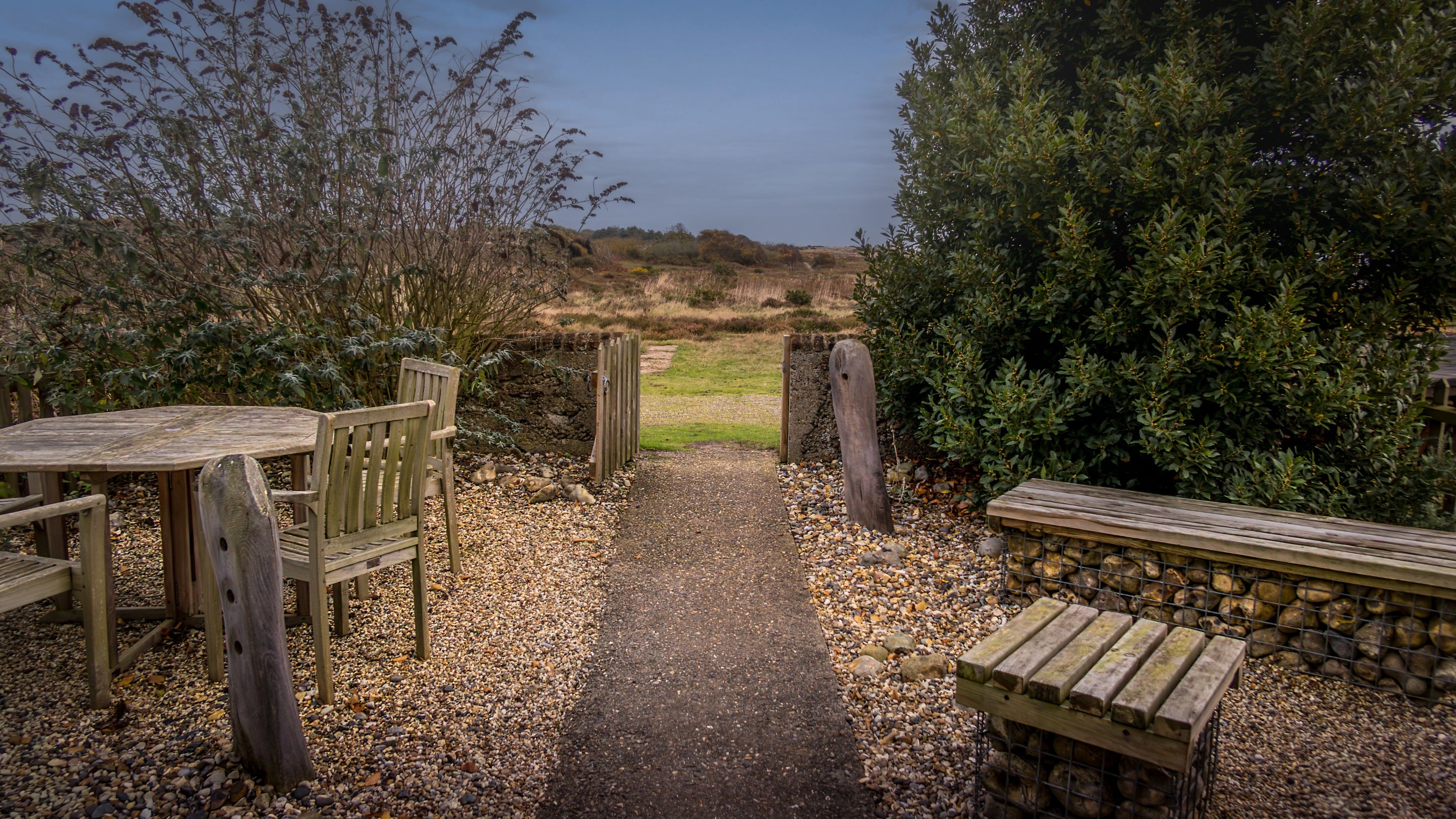 The shared garden at Stonechat with direct access on to Dunwich Heath
